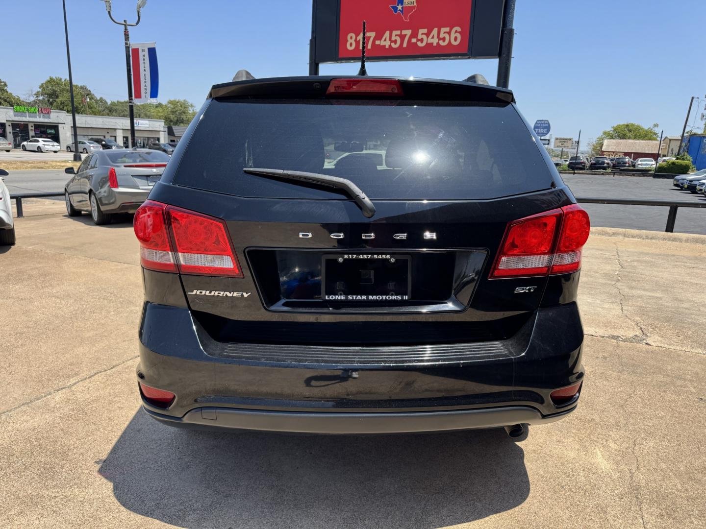 2016 BLACK DODGE JOURNEY SXT (3C4PDCBBXGT) , located at 5900 E. Lancaster Ave., Fort Worth, TX, 76112, (817) 457-5456, 0.000000, 0.000000- Photo#4