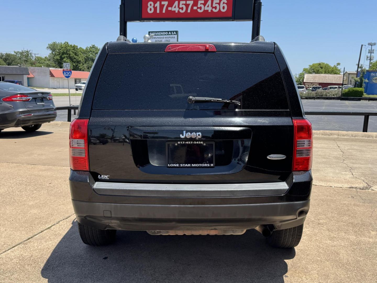2014 BLACK /Gray JEEP PATRIOT LATITUDE Latitude 4dr SUV (1C4NJPFA7ED) with an 2.0L I4 engine, CVT transmission, located at 5900 E. Lancaster Ave., Fort Worth, TX, 76112, (817) 457-5456, 0.000000, 0.000000 - This is a 2014 Jeep Patriot Latitude 4dr SUV that is in excellent condition. There are no dents or scratches. The interior is clean with no rips or tears or stains. All power windows, door locks and seats. Ice cold AC for those hot Texas summer days. It is equipped with a CD player, AM/FM radio, AUX - Photo#4