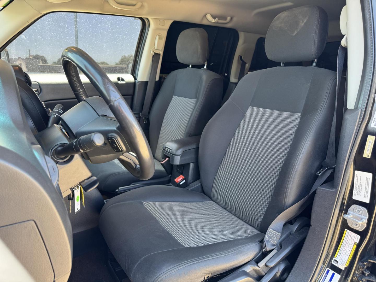 2014 BLACK /Gray JEEP PATRIOT LATITUDE Latitude 4dr SUV (1C4NJPFA7ED) with an 2.0L I4 engine, CVT transmission, located at 5900 E. Lancaster Ave., Fort Worth, TX, 76112, (817) 457-5456, 0.000000, 0.000000 - This is a 2014 Jeep Patriot Latitude 4dr SUV that is in excellent condition. There are no dents or scratches. The interior is clean with no rips or tears or stains. All power windows, door locks and seats. Ice cold AC for those hot Texas summer days. It is equipped with a CD player, AM/FM radio, AUX - Photo#9