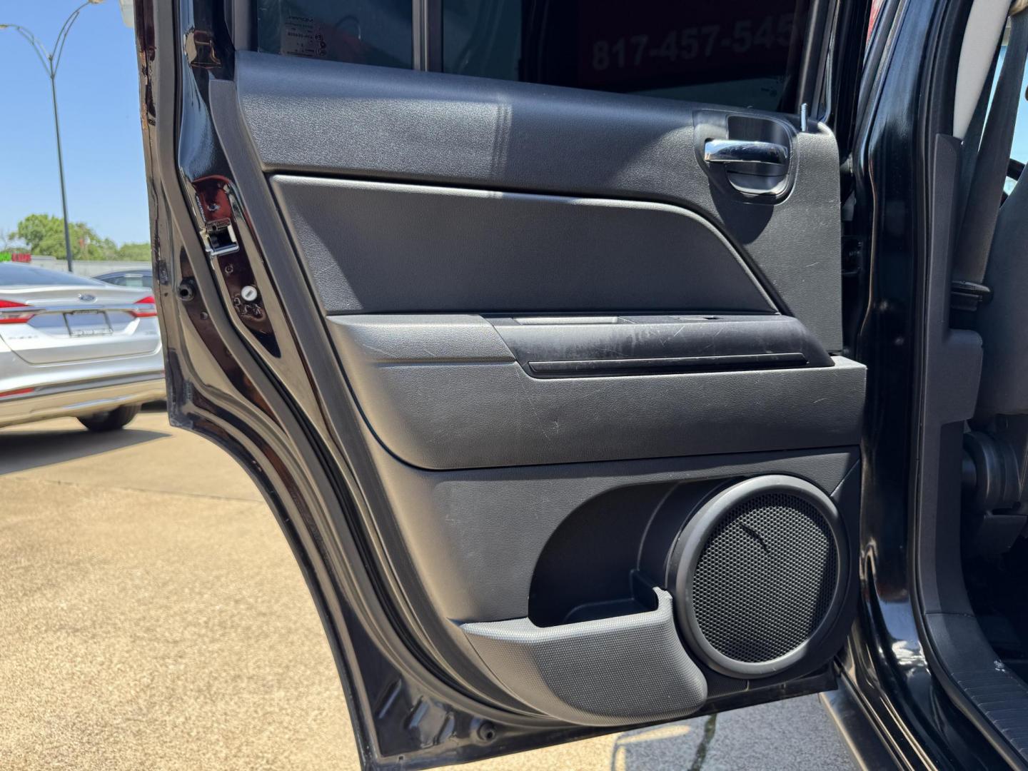 2014 BLACK /Gray JEEP PATRIOT LATITUDE Latitude 4dr SUV (1C4NJPFA7ED) with an 2.0L I4 engine, CVT transmission, located at 5900 E. Lancaster Ave., Fort Worth, TX, 76112, (817) 457-5456, 0.000000, 0.000000 - This is a 2014 Jeep Patriot Latitude 4dr SUV that is in excellent condition. There are no dents or scratches. The interior is clean with no rips or tears or stains. All power windows, door locks and seats. Ice cold AC for those hot Texas summer days. It is equipped with a CD player, AM/FM radio, AUX - Photo#10