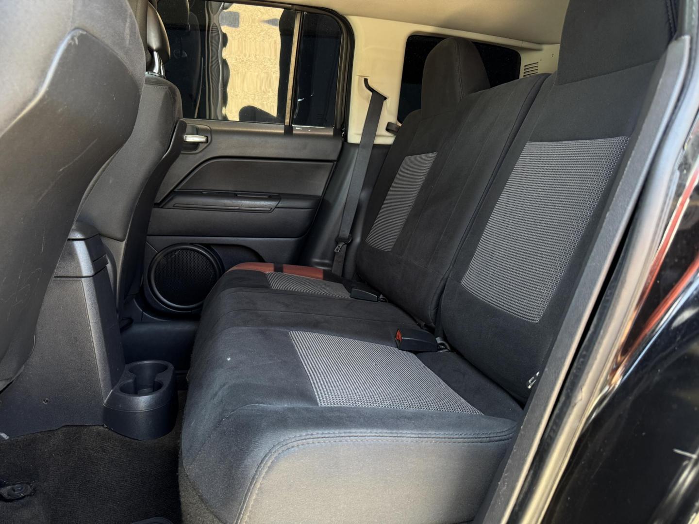 2014 BLACK /Gray JEEP PATRIOT LATITUDE Latitude 4dr SUV (1C4NJPFA7ED) with an 2.0L I4 engine, CVT transmission, located at 5900 E. Lancaster Ave., Fort Worth, TX, 76112, (817) 457-5456, 0.000000, 0.000000 - This is a 2014 Jeep Patriot Latitude 4dr SUV that is in excellent condition. There are no dents or scratches. The interior is clean with no rips or tears or stains. All power windows, door locks and seats. Ice cold AC for those hot Texas summer days. It is equipped with a CD player, AM/FM radio, AUX - Photo#11