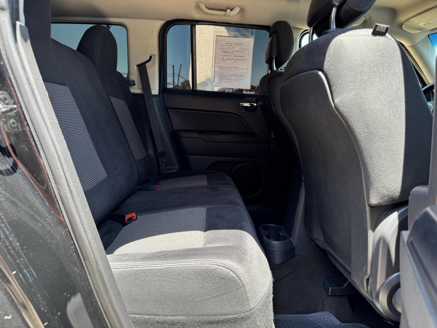 2014 BLACK /Gray JEEP PATRIOT LATITUDE Latitude 4dr SUV (1C4NJPFA7ED) with an 2.0L I4 engine, CVT transmission, located at 5900 E. Lancaster Ave., Fort Worth, TX, 76112, (817) 457-5456, 0.000000, 0.000000 - This is a 2014 Jeep Patriot Latitude 4dr SUV that is in excellent condition. There are no dents or scratches. The interior is clean with no rips or tears or stains. All power windows, door locks and seats. Ice cold AC for those hot Texas summer days. It is equipped with a CD player, AM/FM radio, AUX - Photo#13