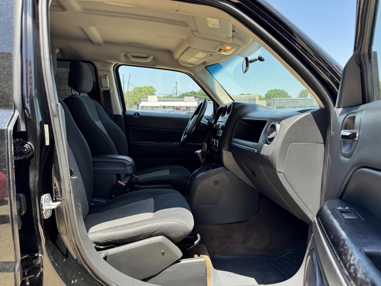 2014 BLACK /Gray JEEP PATRIOT LATITUDE Latitude 4dr SUV (1C4NJPFA7ED) with an 2.0L I4 engine, CVT transmission, located at 5900 E. Lancaster Ave., Fort Worth, TX, 76112, (817) 457-5456, 0.000000, 0.000000 - This is a 2014 Jeep Patriot Latitude 4dr SUV that is in excellent condition. There are no dents or scratches. The interior is clean with no rips or tears or stains. All power windows, door locks and seats. Ice cold AC for those hot Texas summer days. It is equipped with a CD player, AM/FM radio, AUX - Photo#15