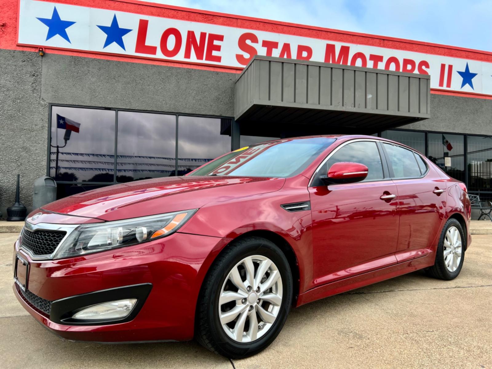 2015 RED KIA OPTIMA EX; LX (5XXGN4A73FG) , located at 5900 E. Lancaster Ave., Fort Worth, TX, 76112, (817) 457-5456, 0.000000, 0.000000 - This is a 2015 KIA OPTIMA EX 4 DR SEDAN that is in excellent condition. There are no dents or scratches. The interior is clean with no rips or tears or stains. All power windows, door locks and seats. Ice cold AC for those hot Texas summer days. It is equipped with a CD player, AM/FM radio, AUX port - Photo #1