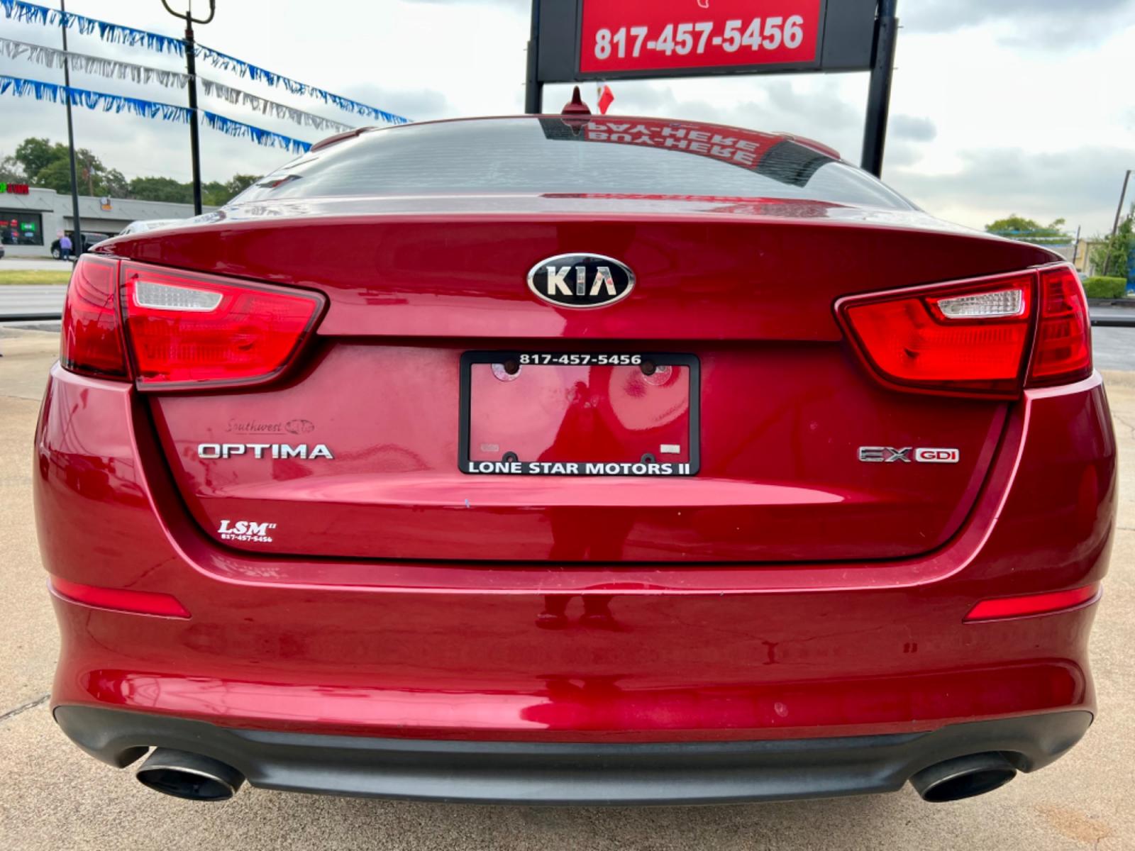 2015 RED KIA OPTIMA EX; LX (5XXGN4A73FG) , located at 5900 E. Lancaster Ave., Fort Worth, TX, 76112, (817) 457-5456, 0.000000, 0.000000 - This is a 2015 KIA OPTIMA EX 4 DR SEDAN that is in excellent condition. There are no dents or scratches. The interior is clean with no rips or tears or stains. All power windows, door locks and seats. Ice cold AC for those hot Texas summer days. It is equipped with a CD player, AM/FM radio, AUX port - Photo #5