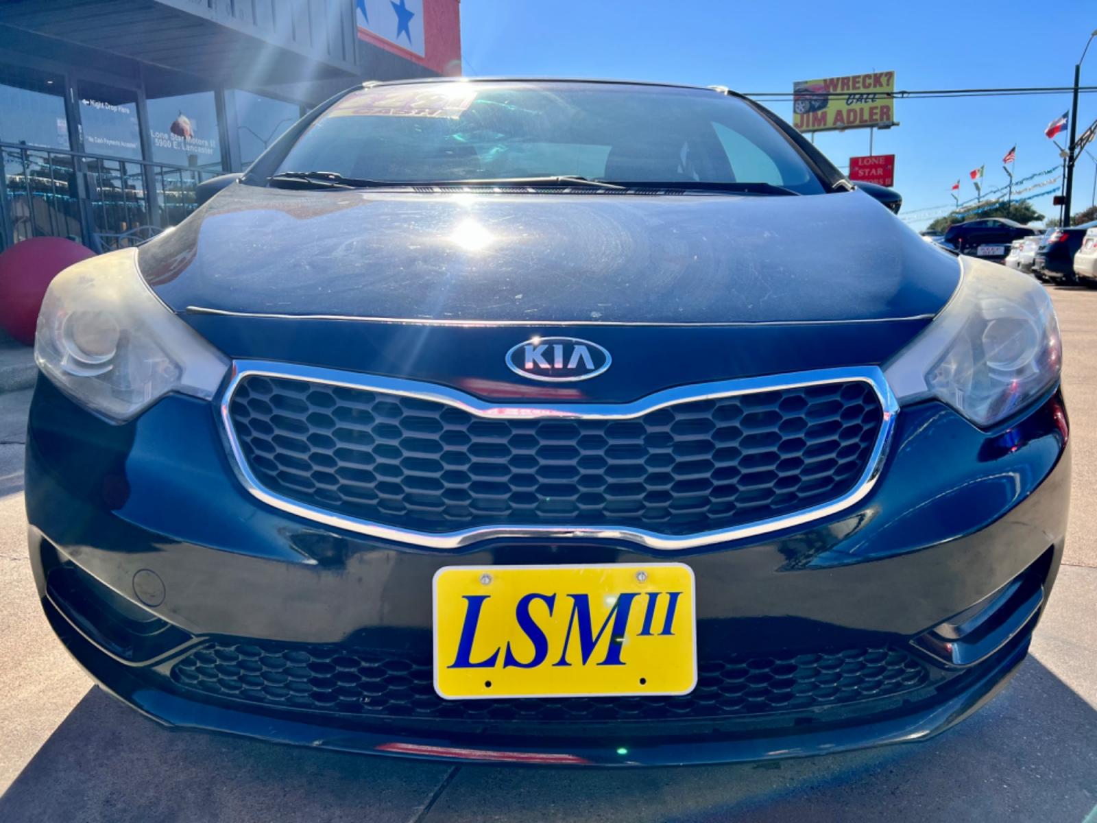 2016 BLACK KIA FORTE LX (KNAFK4A61G5) , located at 5900 E. Lancaster Ave., Fort Worth, TX, 76112, (817) 457-5456, 0.000000, 0.000000 - Cash CASH CAR ONLY, NO FINANCING AVAILABLE. THIS 2016 KIA FORTE LX 4 DOOR SEDAN RUNS AND DRIVES GREAT. IT IS EQUIPPED WITH A CD PLAYER, AM/FM RADIO AND AN AUX PORT. THE TIRES ARE IN GOOD CONDITION AND STILL HAVE TREAD LEFT ON THEM. THIS CAR WILL NOT LAST SO ACT FAST! Call or text Frances a - Photo #2