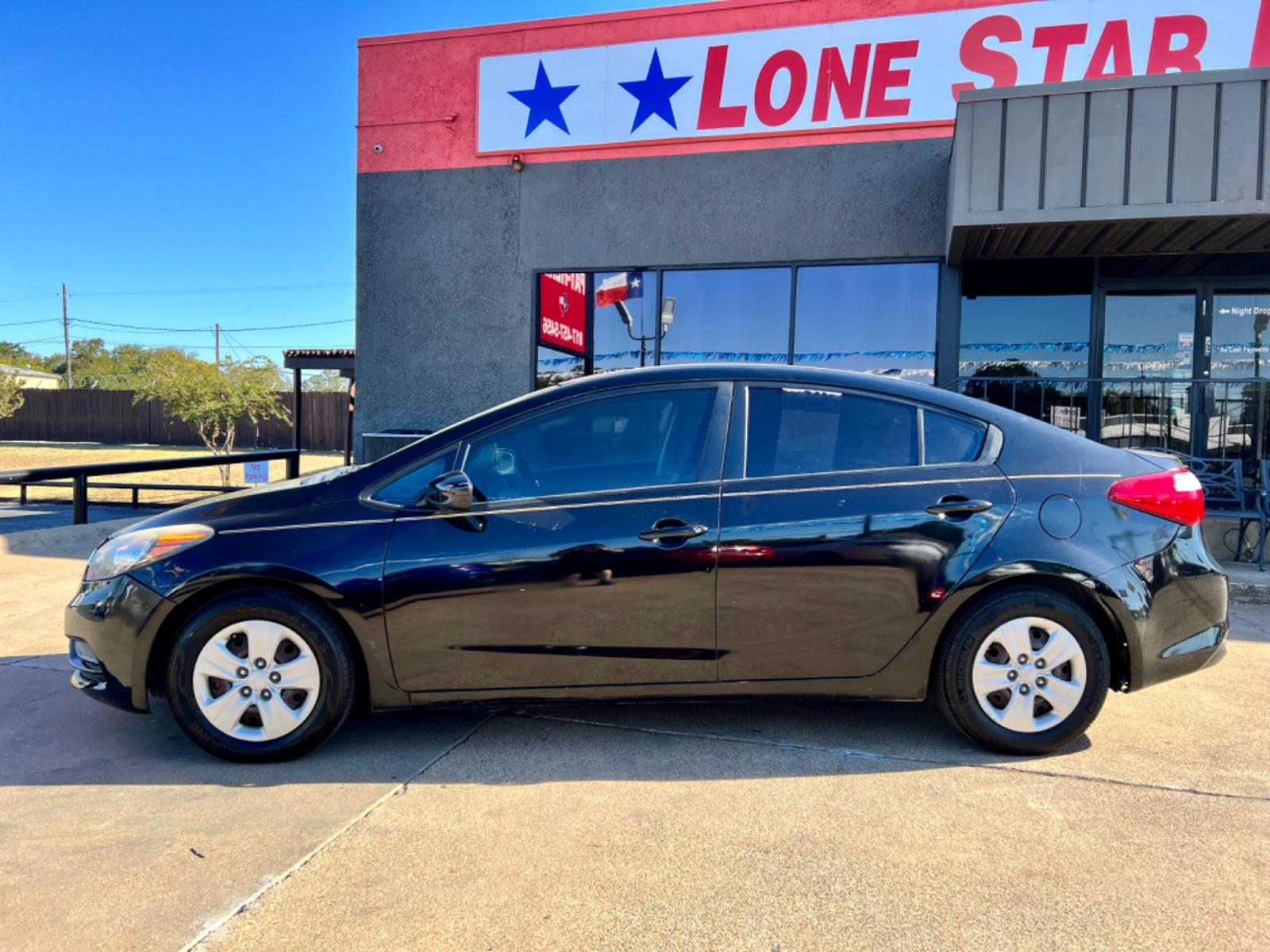 2016 BLACK KIA FORTE LX (KNAFK4A61G5) , located at 5900 E. Lancaster Ave., Fort Worth, TX, 76112, (817) 457-5456, 0.000000, 0.000000 - Cash CASH CAR ONLY, NO FINANCING AVAILABLE. THIS 2016 KIA FORTE LX 4 DOOR SEDAN RUNS AND DRIVES GREAT. IT IS EQUIPPED WITH A CD PLAYER, AM/FM RADIO AND AN AUX PORT. THE TIRES ARE IN GOOD CONDITION AND STILL HAVE TREAD LEFT ON THEM. THIS CAR WILL NOT LAST SO ACT FAST! Call or text Frances a - Photo #3