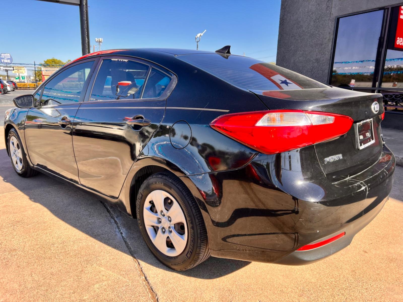 2016 BLACK KIA FORTE LX (KNAFK4A61G5) , located at 5900 E. Lancaster Ave., Fort Worth, TX, 76112, (817) 457-5456, 0.000000, 0.000000 - Cash CASH CAR ONLY, NO FINANCING AVAILABLE. THIS 2016 KIA FORTE LX 4 DOOR SEDAN RUNS AND DRIVES GREAT. IT IS EQUIPPED WITH A CD PLAYER, AM/FM RADIO AND AN AUX PORT. THE TIRES ARE IN GOOD CONDITION AND STILL HAVE TREAD LEFT ON THEM. THIS CAR WILL NOT LAST SO ACT FAST! Call or text Frances a - Photo #4