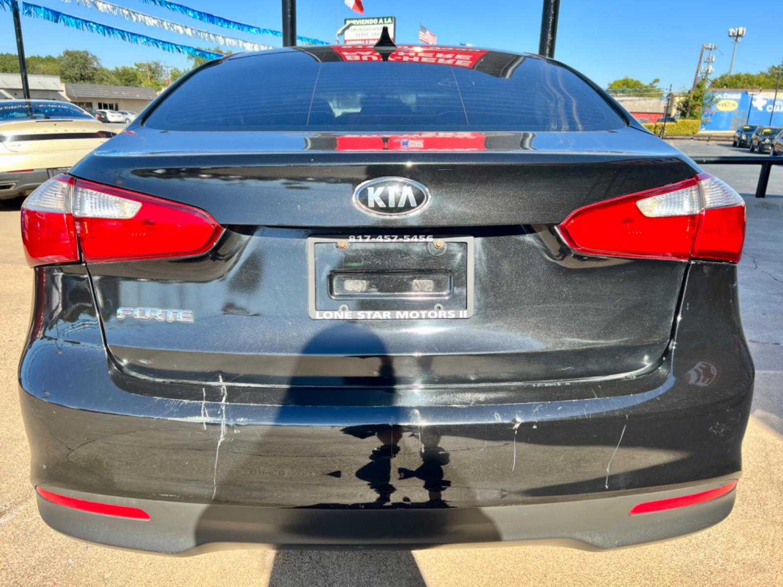 2016 BLACK KIA FORTE LX (KNAFK4A61G5) , located at 5900 E. Lancaster Ave., Fort Worth, TX, 76112, (817) 457-5456, 0.000000, 0.000000 - Cash CASH CAR ONLY, NO FINANCING AVAILABLE. THIS 2016 KIA FORTE LX 4 DOOR SEDAN RUNS AND DRIVES GREAT. IT IS EQUIPPED WITH A CD PLAYER, AM/FM RADIO AND AN AUX PORT. THE TIRES ARE IN GOOD CONDITION AND STILL HAVE TREAD LEFT ON THEM. THIS CAR WILL NOT LAST SO ACT FAST! Call or text Frances a - Photo #5