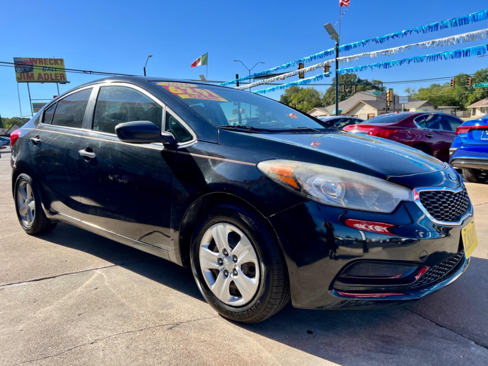 2016 BLACK KIA FORTE LX (KNAFK4A61G5) , located at 5900 E. Lancaster Ave., Fort Worth, TX, 76112, (817) 457-5456, 0.000000, 0.000000 - Cash CASH CAR ONLY, NO FINANCING AVAILABLE. THIS 2016 KIA FORTE LX 4 DOOR SEDAN RUNS AND DRIVES GREAT. IT IS EQUIPPED WITH A CD PLAYER, AM/FM RADIO AND AN AUX PORT. THE TIRES ARE IN GOOD CONDITION AND STILL HAVE TREAD LEFT ON THEM. THIS CAR WILL NOT LAST SO ACT FAST! Call or text Frances a - Photo #8