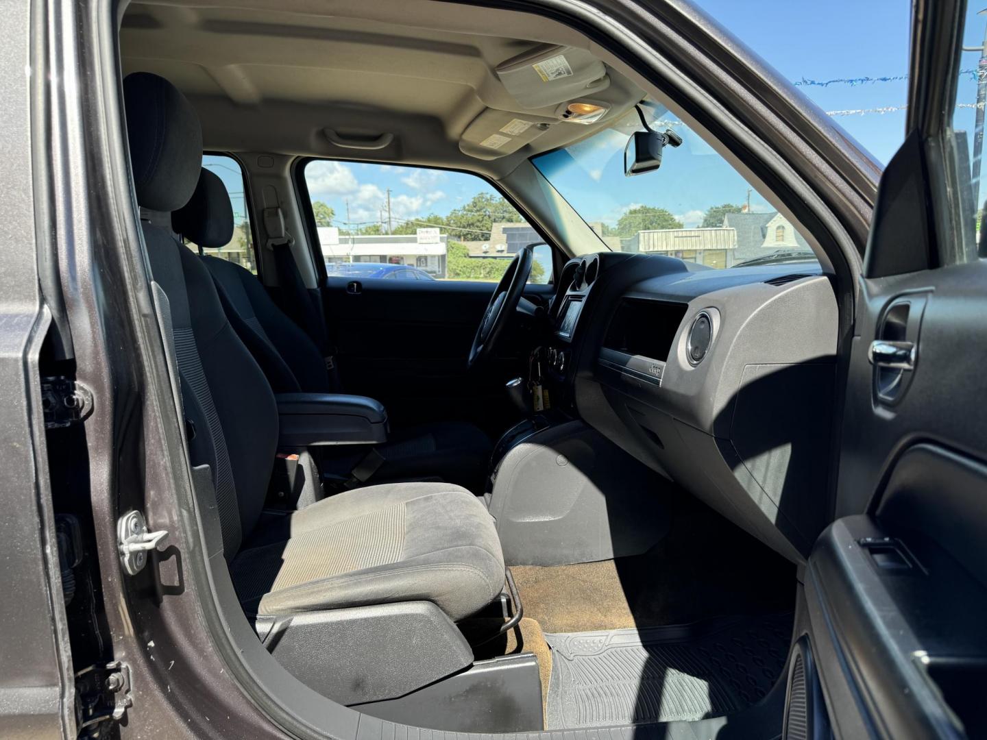 2016 GRAY JEEP PATRIOT SPORT (1C4NJPBA6GD) , located at 5900 E. Lancaster Ave., Fort Worth, TX, 76112, (817) 457-5456, 0.000000, 0.000000 - This is a 2016 JEEP PATRIOT 4 DR WAGON that is in excellent condition. The interior is clean with no rips or tears or stains. All power windows, door locks and seats. Ice cold AC for those hot Texas summer days. It is equipped with a CD player, AM/FM radio, AUX port, Bluetooth connectivity and Siriu - Photo#16