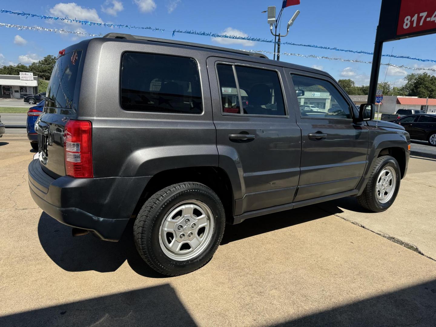 2016 GRAY JEEP PATRIOT SPORT (1C4NJPBA6GD) , located at 5900 E. Lancaster Ave., Fort Worth, TX, 76112, (817) 457-5456, 0.000000, 0.000000 - This is a 2016 JEEP PATRIOT 4 DR WAGON that is in excellent condition. The interior is clean with no rips or tears or stains. All power windows, door locks and seats. Ice cold AC for those hot Texas summer days. It is equipped with a CD player, AM/FM radio, AUX port, Bluetooth connectivity and Siriu - Photo#4