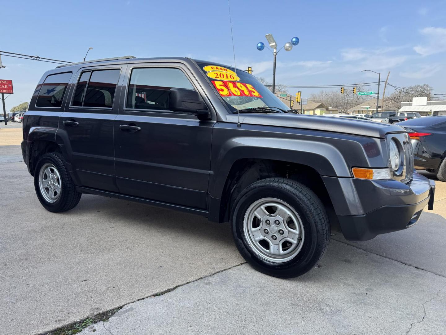 2016 GRAY JEEP PATRIOT SPORT (1C4NJPBA6GD) , located at 5900 E. Lancaster Ave., Fort Worth, TX, 76112, (817) 457-5456, 0.000000, 0.000000 - This is a 2016 JEEP PATRIOT 4 DR WAGON that is in excellent condition. The interior is clean with no rips or tears or stains. All power windows, door locks and seats. Ice cold AC for those hot Texas summer days. It is equipped with a CD player, AM/FM radio, AUX port, Bluetooth connectivity and Siriu - Photo#3