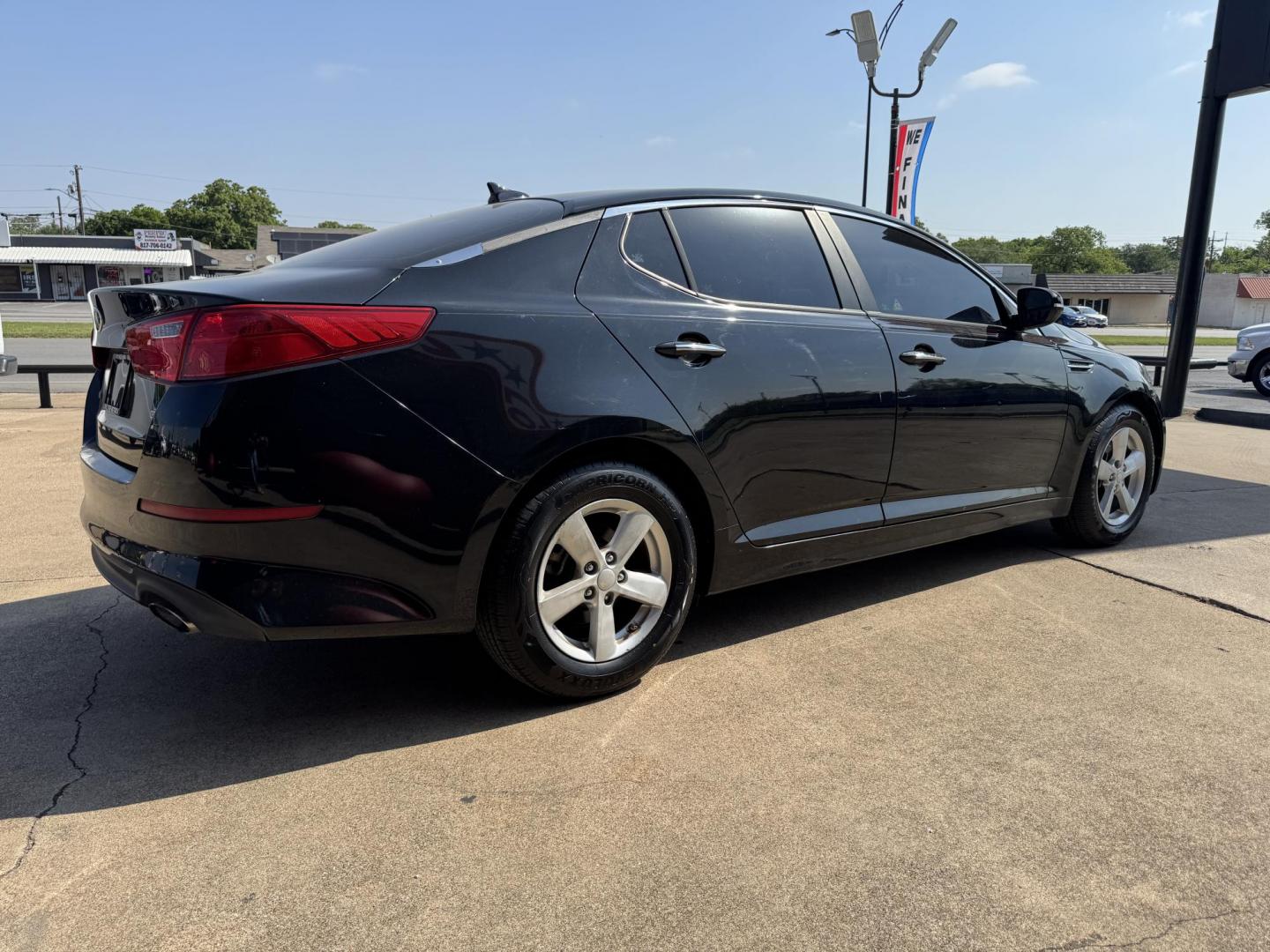 2015 BLACK KIA OPTIMA LX (KNAGM4A74F5) , located at 5900 E. Lancaster Ave., Fort Worth, TX, 76112, (817) 457-5456, 0.000000, 0.000000 - This is a 2015KIA OPTIMA 4 DR SEDAN that is in excellent condition. The interior is clean with no rips or tears or stains. All power windows, door locks and seats. Ice cold AC for those hot Texas summer days. It is equipped with a CD player, AM/FM radio, AUX port, Bluetooth connectivity and Sirius X - Photo#3