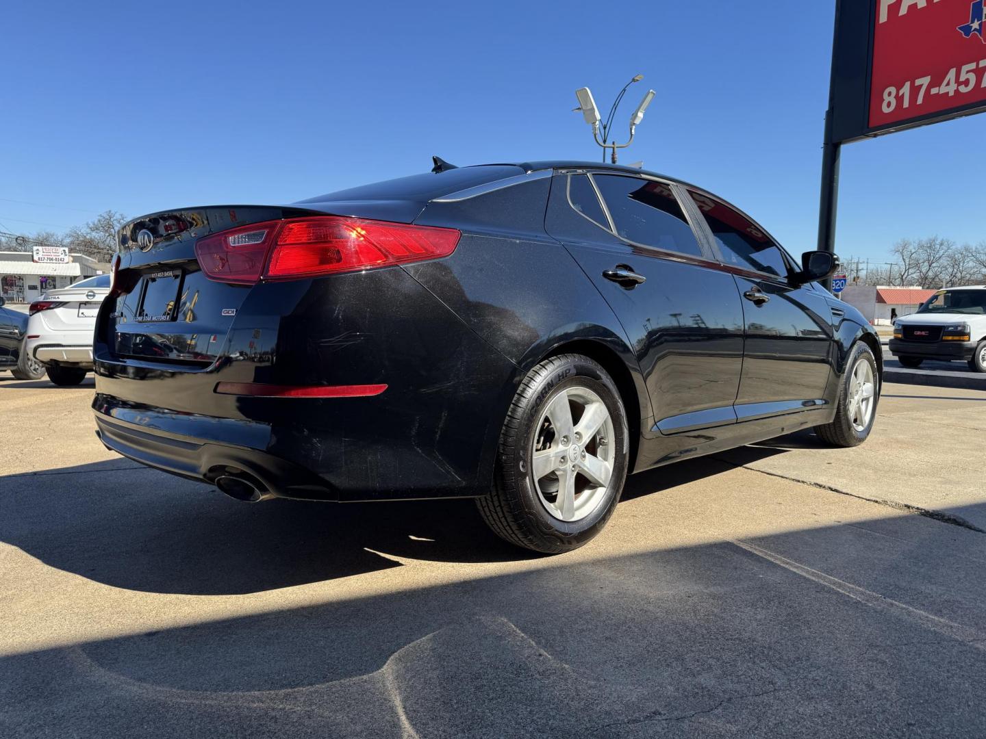 2015 BLACK KIA OPTIMA LX (KNAGM4A74F5) , located at 5900 E. Lancaster Ave., Fort Worth, TX, 76112, (817) 457-5456, 0.000000, 0.000000 - Photo#3