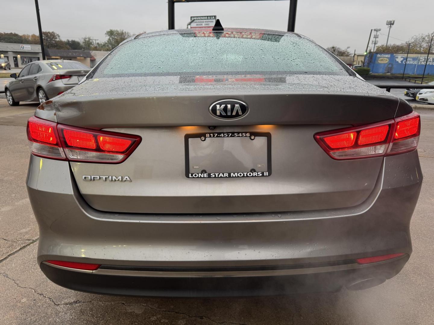 2016 GRAY KIA OPTIMA (5XXGT4L35GG) , located at 5900 E. Lancaster Ave., Fort Worth, TX, 76112, (817) 457-5456, 0.000000, 0.000000 - This is a 2016 KIA OPTIMA 4 DR SEDAN that is in excellent condition. The interior is clean with no rips or tears or stains. All power windows, door locks and seats. Ice cold AC for those hot Texas summer days. It is equipped with a CD player, AM/FM radio, AUX port, Bluetooth connectivity and Sirius - Photo#7