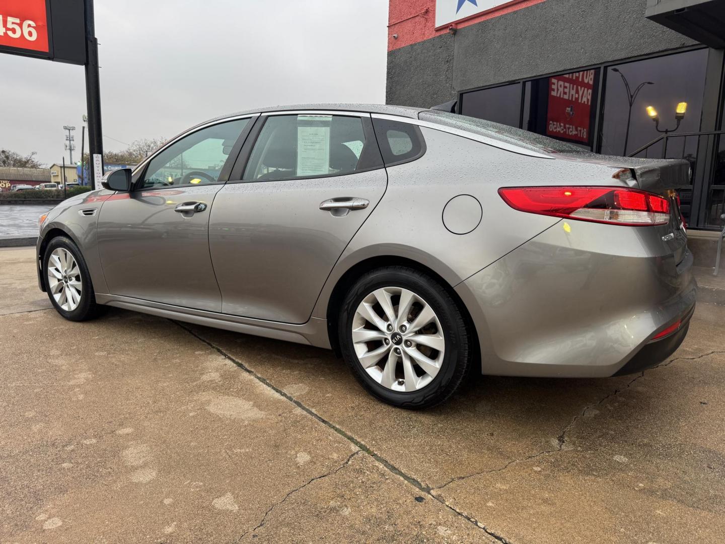 2016 GRAY KIA OPTIMA (5XXGT4L35GG) , located at 5900 E. Lancaster Ave., Fort Worth, TX, 76112, (817) 457-5456, 0.000000, 0.000000 - This is a 2016 KIA OPTIMA 4 DR SEDAN that is in excellent condition. The interior is clean with no rips or tears or stains. All power windows, door locks and seats. Ice cold AC for those hot Texas summer days. It is equipped with a CD player, AM/FM radio, AUX port, Bluetooth connectivity and Sirius - Photo#8