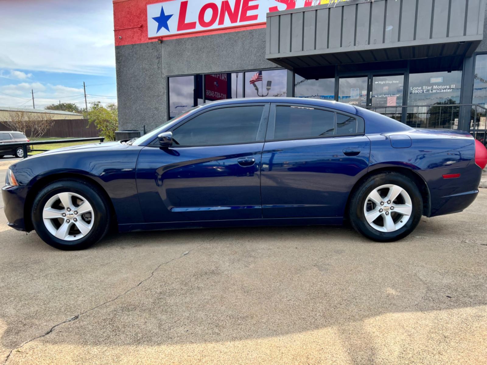 2014 BLUE /Gray DODGE CHARGER SE 4dr Sedan (2C3CDXBGXEH) with an 3.6L V6 engine, Automatic 5-Speed transmission, located at 5900 E. Lancaster Ave., Fort Worth, TX, 76112, (817) 457-5456, 0.000000, 0.000000 - This is a 2014 Dodge Charger SE 4dr Sedan that is in excellent condition. There are no dents or scratches. The interior is clean with no rips or tears or stains. All power windows, door locks and seats. Ice cold AC for those hot Texas summer days. It is equipped with a CD player, AM/FM radio, AUX po - Photo #2