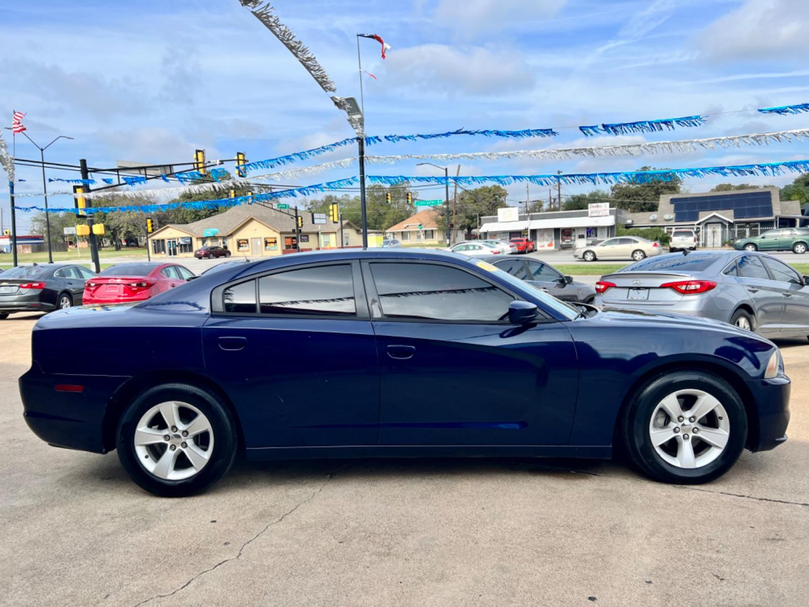 2014 BLUE /Gray DODGE CHARGER SE 4dr Sedan (2C3CDXBGXEH) with an 3.6L V6 engine, Automatic 5-Speed transmission, located at 5900 E. Lancaster Ave., Fort Worth, TX, 76112, (817) 457-5456, 0.000000, 0.000000 - This is a 2014 Dodge Charger SE 4dr Sedan that is in excellent condition. There are no dents or scratches. The interior is clean with no rips or tears or stains. All power windows, door locks and seats. Ice cold AC for those hot Texas summer days. It is equipped with a CD player, AM/FM radio, AUX po - Photo #6