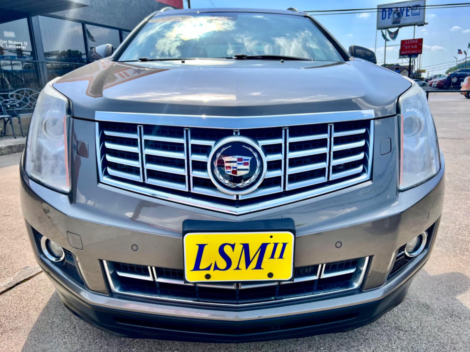 2014 PEWTER CADILLAC SRX (3GYFNDE35ES) , located at 5900 E. Lancaster Ave., Fort Worth, TX, 76112, (817) 457-5456, 0.000000, 0.000000 - This is a 2014 CADILLAC SRX LUXURY 4 DR WAGON that is in excellent condition. The interior is clean with no rips or tears or stains. All power windows, door locks and seats. Ice cold AC for those hot Texas summer days. It is equipped with a CD player, AM/FM radio, AUX port, Bluetooth connectivity an - Photo #2