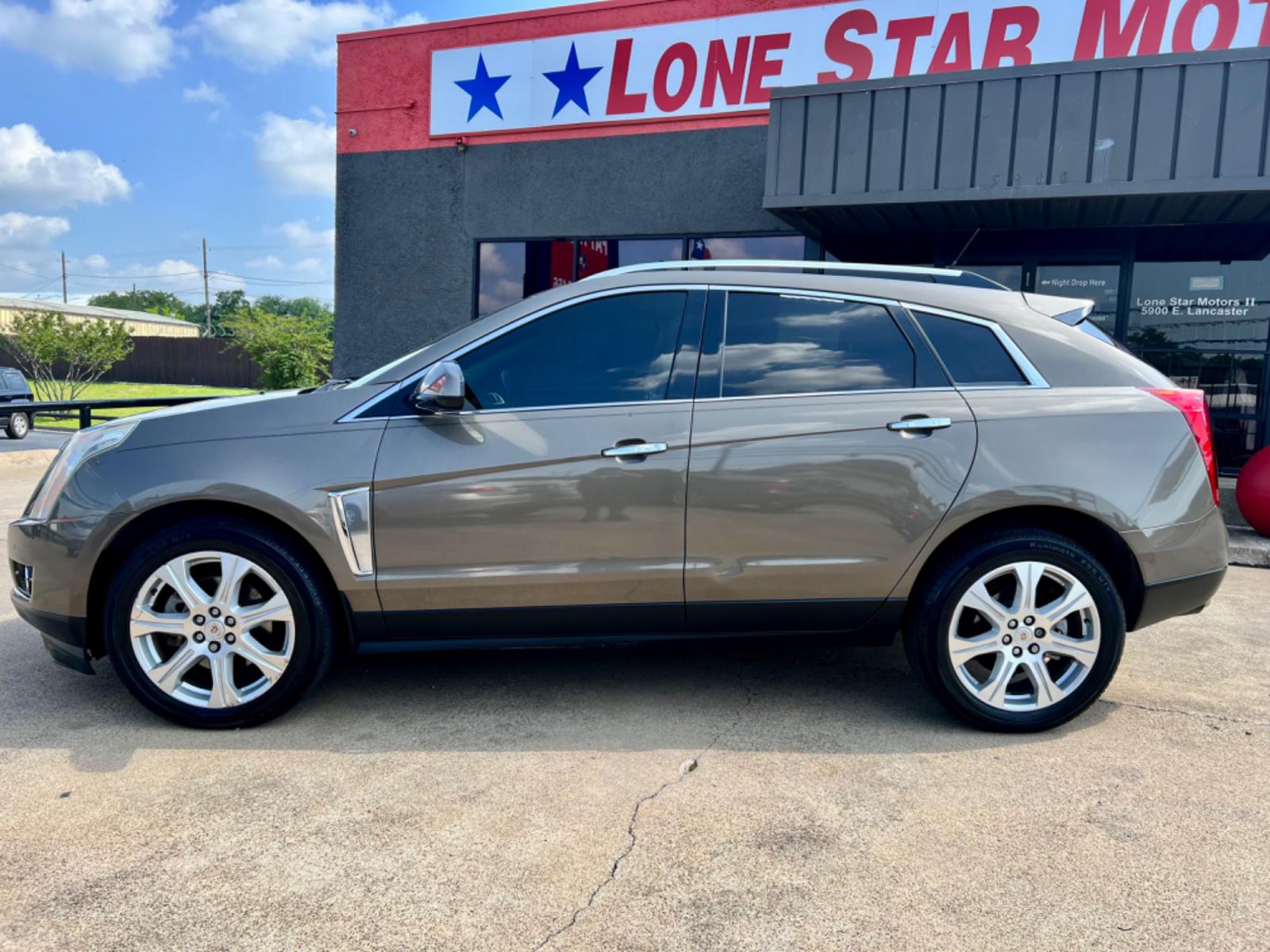 2014 PEWTER CADILLAC SRX (3GYFNDE35ES) , located at 5900 E. Lancaster Ave., Fort Worth, TX, 76112, (817) 457-5456, 0.000000, 0.000000 - This is a 2014 CADILLAC SRX LUXURY 4 DR WAGON that is in excellent condition. The interior is clean with no rips or tears or stains. All power windows, door locks and seats. Ice cold AC for those hot Texas summer days. It is equipped with a CD player, AM/FM radio, AUX port, Bluetooth connectivity an - Photo #3