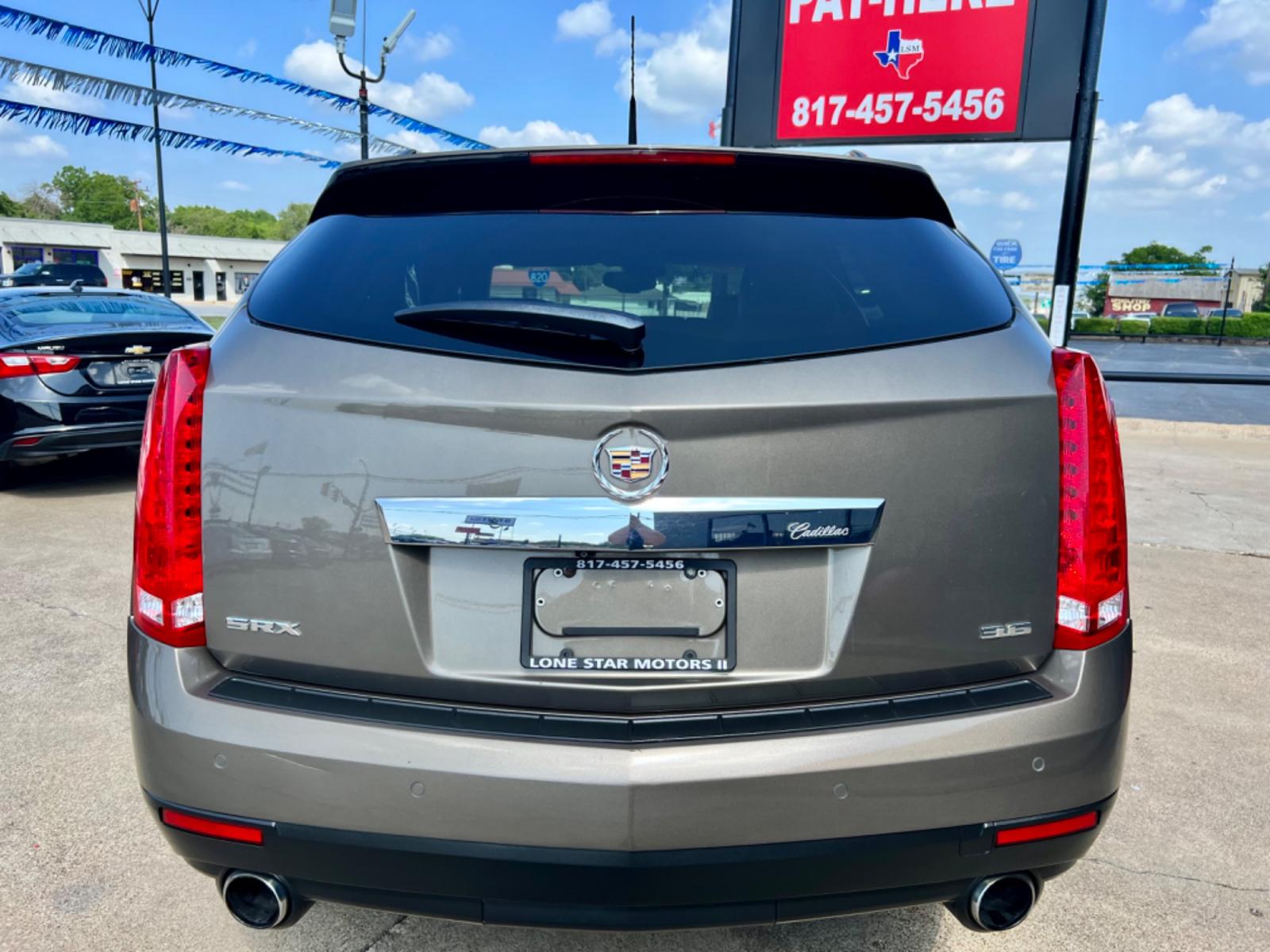 2014 PEWTER CADILLAC SRX (3GYFNDE35ES) , located at 5900 E. Lancaster Ave., Fort Worth, TX, 76112, (817) 457-5456, 0.000000, 0.000000 - This is a 2014 CADILLAC SRX LUXURY 4 DR WAGON that is in excellent condition. The interior is clean with no rips or tears or stains. All power windows, door locks and seats. Ice cold AC for those hot Texas summer days. It is equipped with a CD player, AM/FM radio, AUX port, Bluetooth connectivity an - Photo #5
