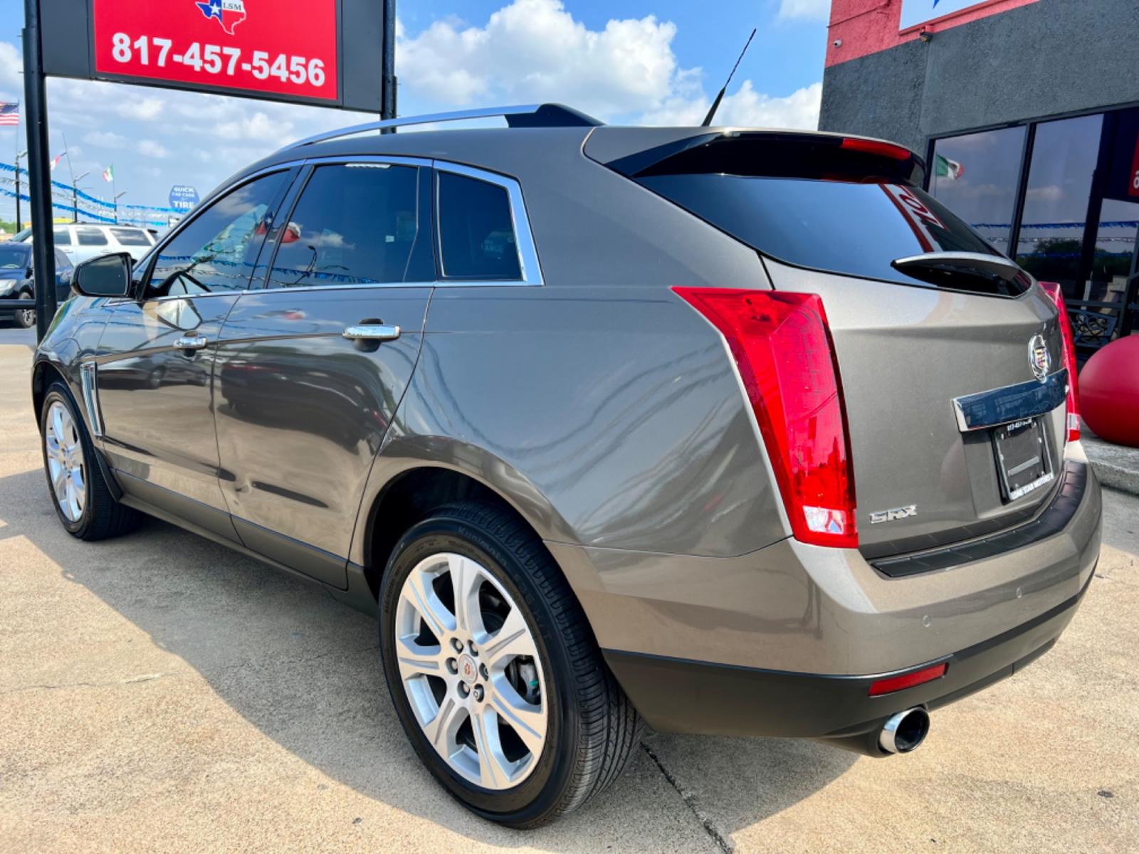 2014 PEWTER CADILLAC SRX (3GYFNDE35ES) , located at 5900 E. Lancaster Ave., Fort Worth, TX, 76112, (817) 457-5456, 0.000000, 0.000000 - This is a 2014 CADILLAC SRX LUXURY 4 DR WAGON that is in excellent condition. The interior is clean with no rips or tears or stains. All power windows, door locks and seats. Ice cold AC for those hot Texas summer days. It is equipped with a CD player, AM/FM radio, AUX port, Bluetooth connectivity an - Photo #4