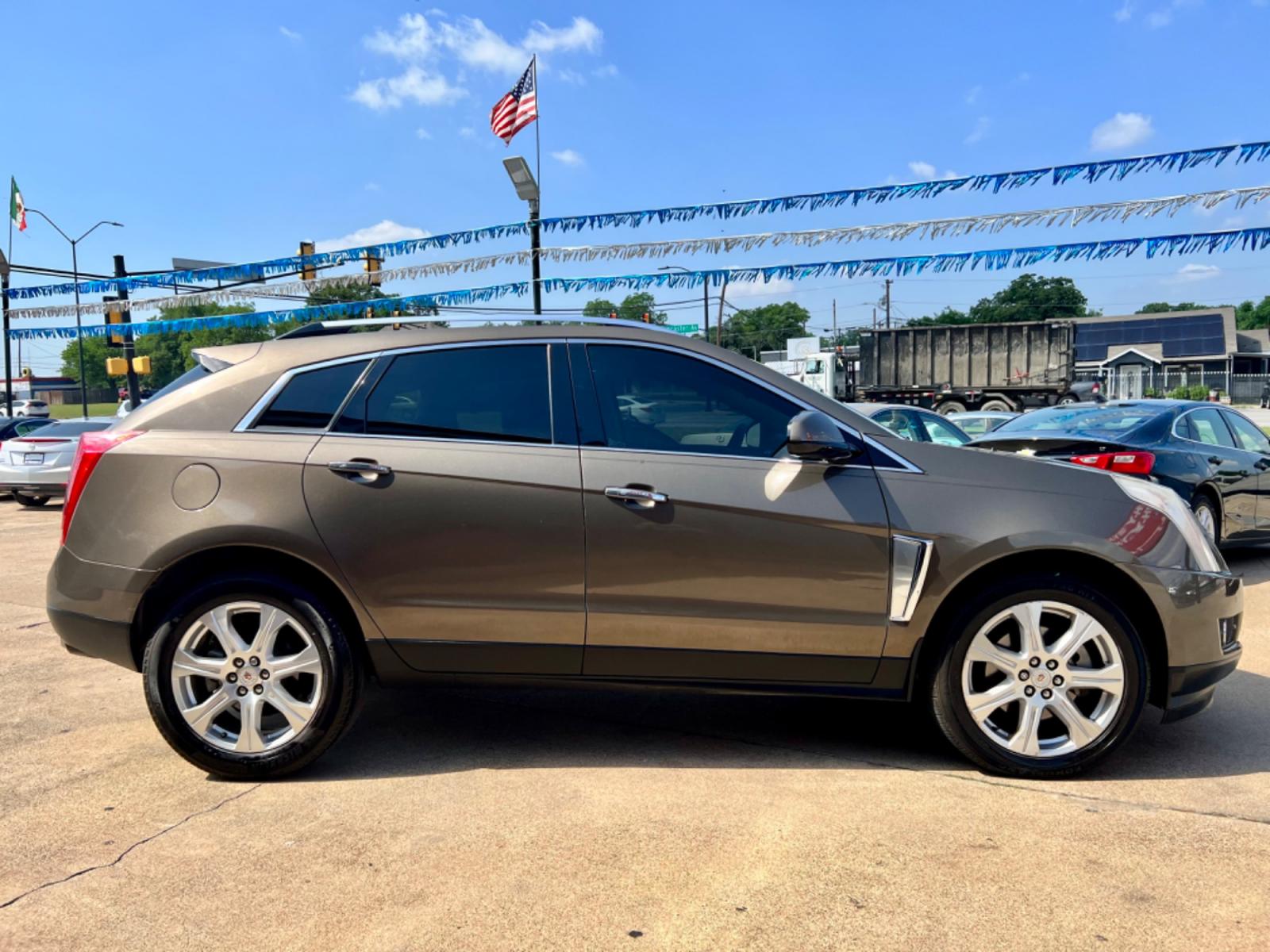 2014 PEWTER CADILLAC SRX (3GYFNDE35ES) , located at 5900 E. Lancaster Ave., Fort Worth, TX, 76112, (817) 457-5456, 0.000000, 0.000000 - This is a 2014 CADILLAC SRX LUXURY 4 DR WAGON that is in excellent condition. The interior is clean with no rips or tears or stains. All power windows, door locks and seats. Ice cold AC for those hot Texas summer days. It is equipped with a CD player, AM/FM radio, AUX port, Bluetooth connectivity an - Photo #7