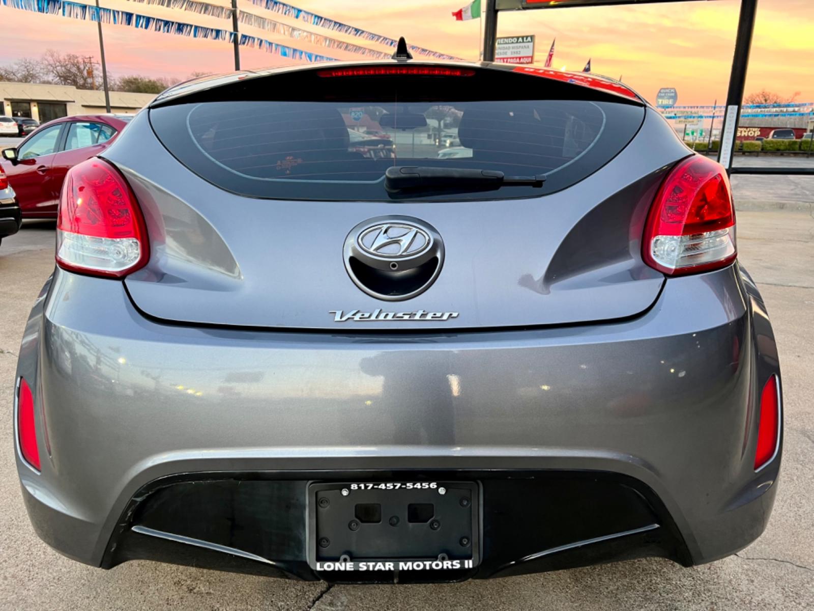 2016 GRAY /Black HYUNDAI VELOSTER Base 3dr Coupe (KMHTC6AD2GU) with an 1.6L I4 engine, Automatic 6-Speed transmission, located at 5900 E. Lancaster Ave., Fort Worth, TX, 76112, (817) 457-5456, 0.000000, 0.000000 - This is a 2016 HYUNDAI VELOSTER 4 DR SEDAN that is in excellent condition. The interior is clean with no rips or tears or stains. All power windows, door locks and seats. Ice cold AC for those hot Texas summer days. It is equipped with a CD player, AM/FM radio, AUX port, Bluetooth connectivity and S - Photo #4