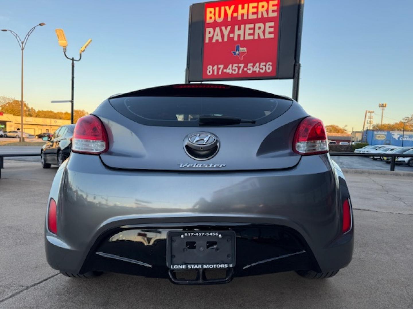 2016 GRAY /Black HYUNDAI VELOSTER Base 3dr Coupe (KMHTC6AD2GU) with an 1.6L I4 engine, Automatic 6-Speed transmission, located at 5900 E. Lancaster Ave., Fort Worth, TX, 76112, (817) 457-5456, 0.000000, 0.000000 - This is a 2016 HYUNDAI VELOSTER 4 DR SEDAN that is in excellent condition. The interior is clean with no rips or tears or stains. All power windows, door locks and seats. Ice cold AC for those hot Texas summer days. It is equipped with a CD player, AM/FM radio, AUX port, Bluetooth connectivity and S - Photo#4