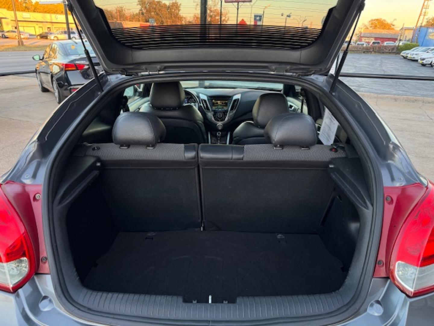 2016 GRAY /Black HYUNDAI VELOSTER Base 3dr Coupe (KMHTC6AD2GU) with an 1.6L I4 engine, Automatic 6-Speed transmission, located at 5900 E. Lancaster Ave., Fort Worth, TX, 76112, (817) 457-5456, 0.000000, 0.000000 - This is a 2016 HYUNDAI VELOSTER 4 DR SEDAN that is in excellent condition. The interior is clean with no rips or tears or stains. All power windows, door locks and seats. Ice cold AC for those hot Texas summer days. It is equipped with a CD player, AM/FM radio, AUX port, Bluetooth connectivity and S - Photo#5