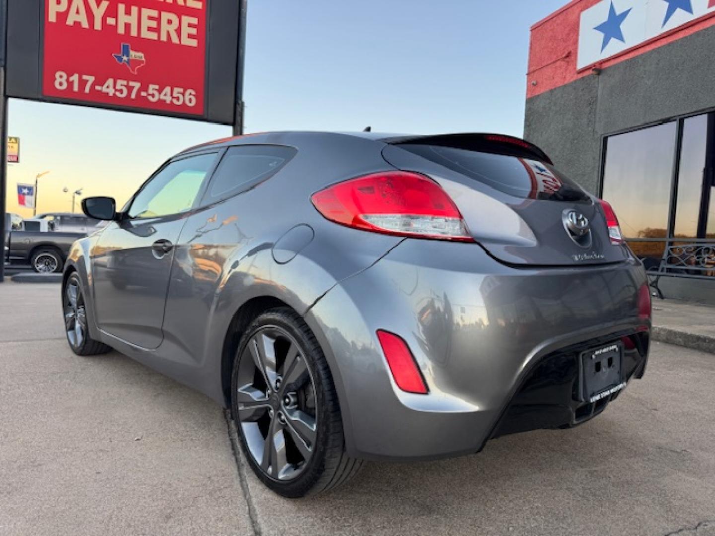 2016 GRAY /Black HYUNDAI VELOSTER Base 3dr Coupe (KMHTC6AD2GU) with an 1.6L I4 engine, Automatic 6-Speed transmission, located at 5900 E. Lancaster Ave., Fort Worth, TX, 76112, (817) 457-5456, 0.000000, 0.000000 - This is a 2016 HYUNDAI VELOSTER 4 DR SEDAN that is in excellent condition. The interior is clean with no rips or tears or stains. All power windows, door locks and seats. Ice cold AC for those hot Texas summer days. It is equipped with a CD player, AM/FM radio, AUX port, Bluetooth connectivity and S - Photo#7