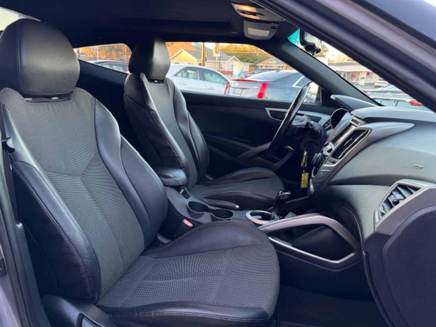 2016 GRAY /Black HYUNDAI VELOSTER Base 3dr Coupe (KMHTC6AD2GU) with an 1.6L I4 engine, Automatic 6-Speed transmission, located at 5900 E. Lancaster Ave., Fort Worth, TX, 76112, (817) 457-5456, 0.000000, 0.000000 - This is a 2016 HYUNDAI VELOSTER 4 DR SEDAN that is in excellent condition. The interior is clean with no rips or tears or stains. All power windows, door locks and seats. Ice cold AC for those hot Texas summer days. It is equipped with a CD player, AM/FM radio, AUX port, Bluetooth connectivity and S - Photo#18