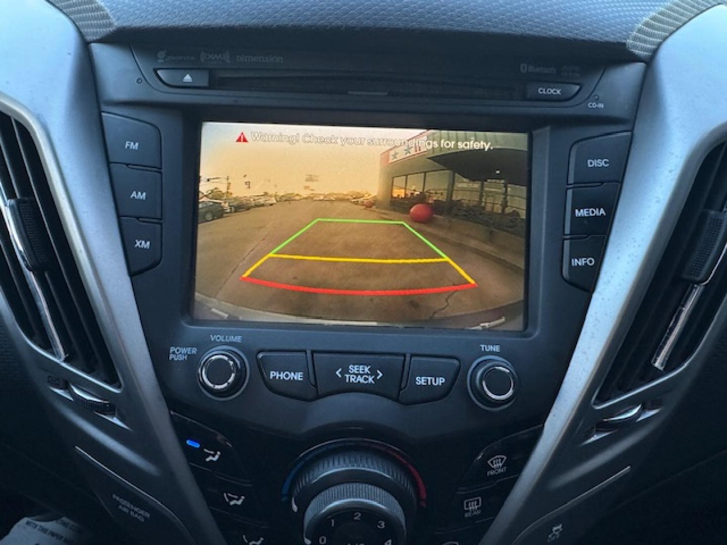 2016 GRAY /Black HYUNDAI VELOSTER Base 3dr Coupe (KMHTC6AD2GU) with an 1.6L I4 engine, Automatic 6-Speed transmission, located at 5900 E. Lancaster Ave., Fort Worth, TX, 76112, (817) 457-5456, 0.000000, 0.000000 - This is a 2016 HYUNDAI VELOSTER 4 DR SEDAN that is in excellent condition. The interior is clean with no rips or tears or stains. All power windows, door locks and seats. Ice cold AC for those hot Texas summer days. It is equipped with a CD player, AM/FM radio, AUX port, Bluetooth connectivity and S - Photo#20