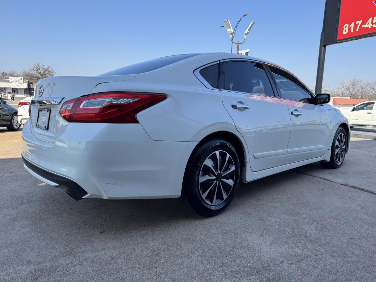 2017 WHITE /Gray NISSAN ALTIMA 2.5 S 4dr Sedan (1N4AL3AP2HN) with an 2.5L I4 engine, CVT transmission, located at 5900 E. Lancaster Ave., Fort Worth, TX, 76112, (817) 457-5456, 0.000000, 0.000000 - This is a 2017 Nissan Altima 2.5 S 4dr Sedan that is in excellent condition. There are no dents or scratches. The interior is clean with no rips or tears or stains. All power windows, door locks and seats. Ice cold AC for those hot Texas summer days. It is equipped with a CD player, AM/FM radio, AUX - Photo#3