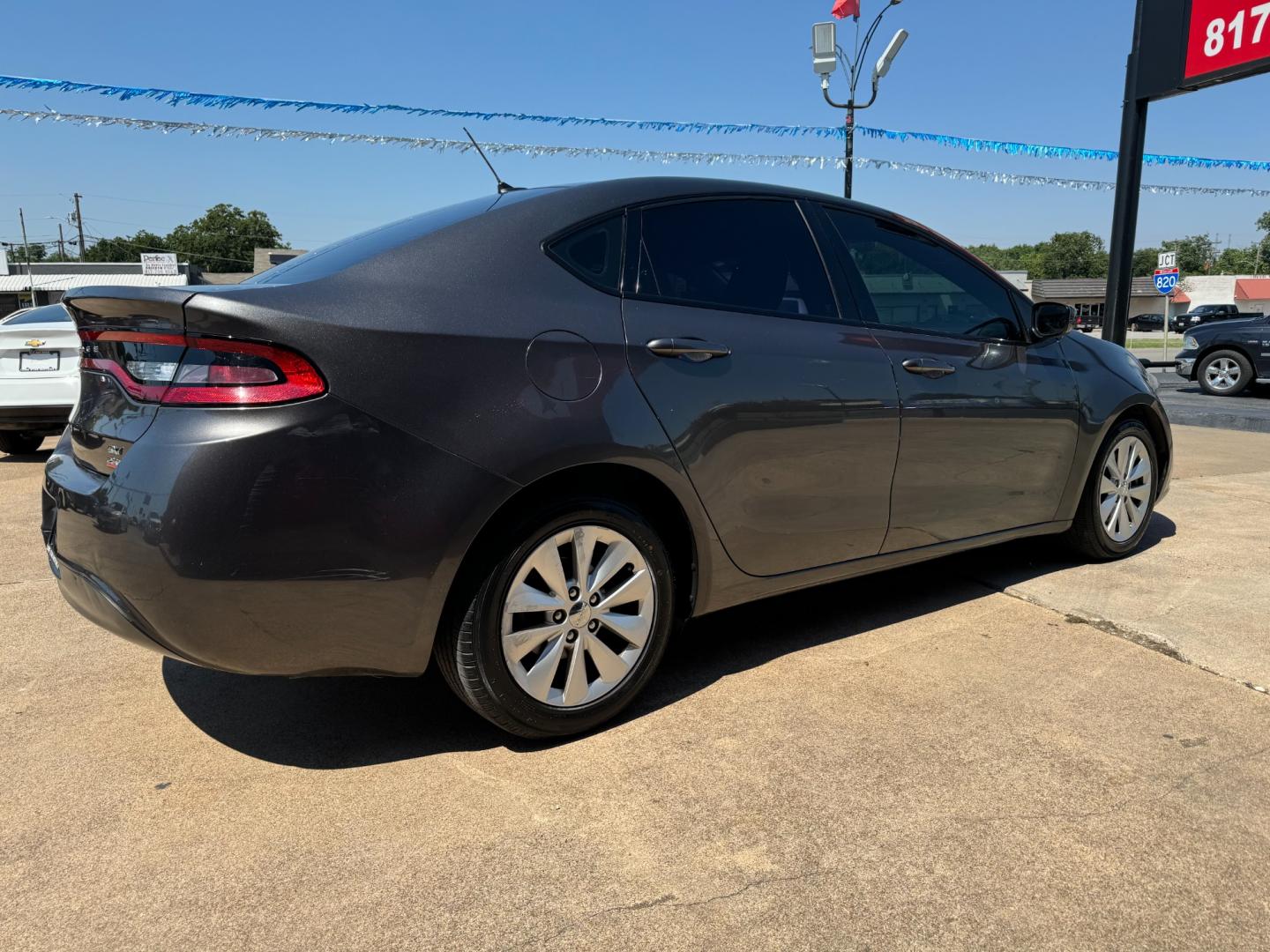 2014 GRAY /Gray DODGE DART SXT 4dr Sedan (1C3CDFBB3ED) with an 2.4L I4 engine, Automatic 6-Speed transmission, located at 5900 E. Lancaster Ave., Fort Worth, TX, 76112, (817) 457-5456, 0.000000, 0.000000 - This is a 2014 Dodge Dart SXT 4dr Sedan that is in excellent condition. There are no dents or scratches. The interior is clean with no rips or tears or stains. All power windows, door locks and seats. Ice cold AC for those hot Texas summer days. It is equipped with a CD player, AM/FM radio, AUX port - Photo#3