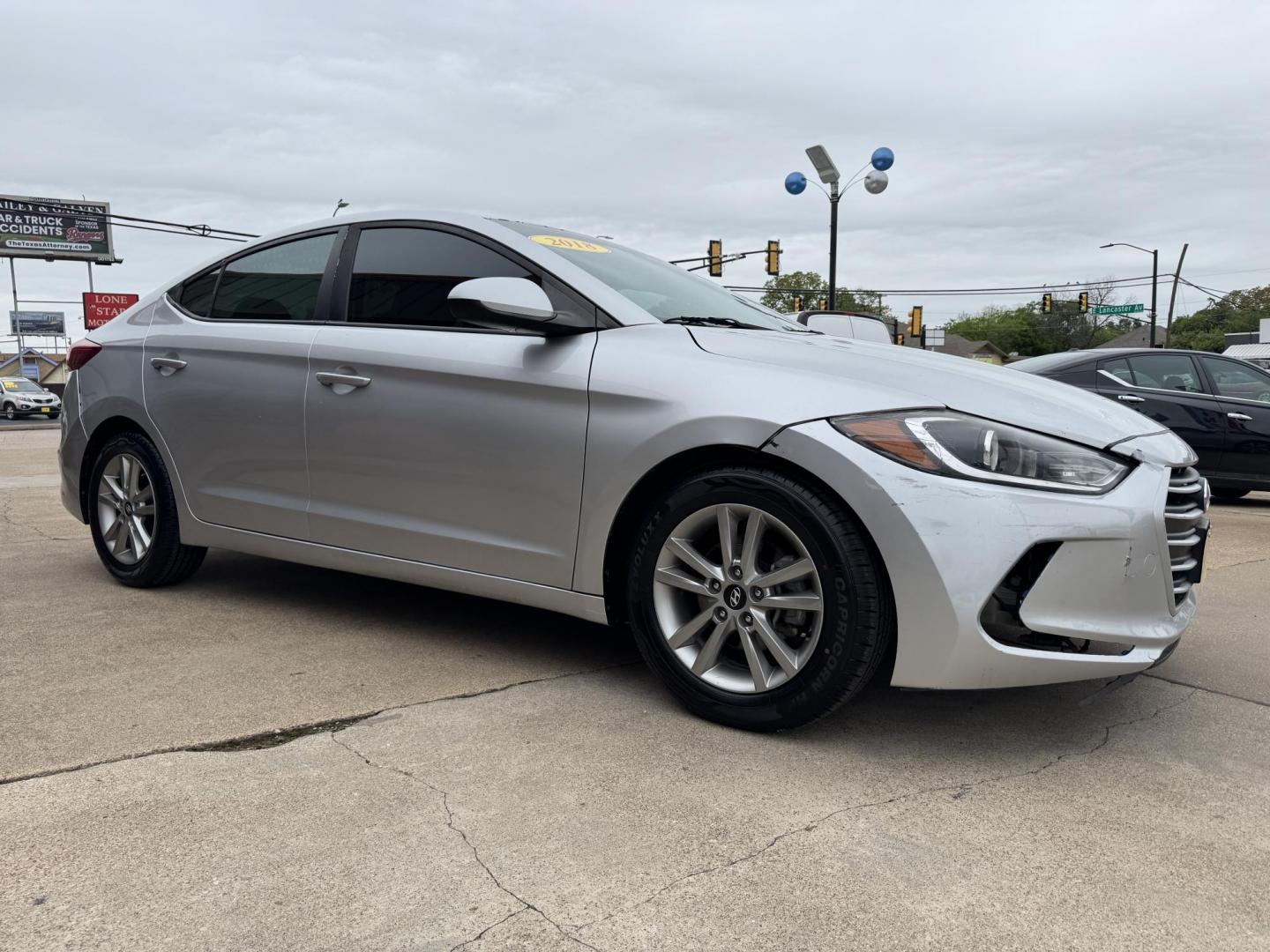 2018 SILVER /Gray HYUNDAI ELANTRA Limited 4dr Sedan (5NPD84LF7JH) with an 2.0L I4 engine, Automatic 6-Speed transmission, located at 5900 E. Lancaster Ave., Fort Worth, TX, 76112, (817) 457-5456, 0.000000, 0.000000 - This is a 2018 Hyundai Elantra Limited 4dr Sedan that is in excellent condition. There are no dents or scratches. The interior is clean with no rips or tears or stains. All power windows, door locks and seats. Ice cold AC for those hot Texas summer days. It is equipped with a CD player, AM/FM radio, - Photo#2