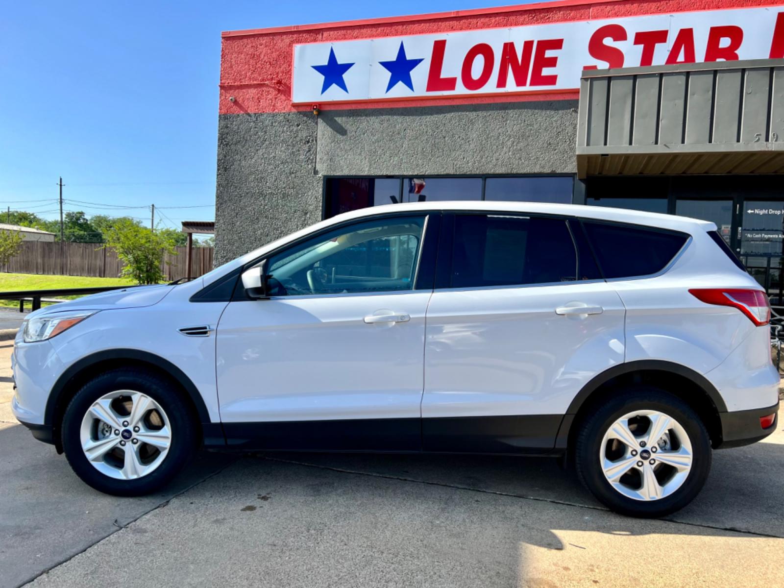 2014 WHITE FORD ESCAPE (1FMCU9GX7EU) , located at 5900 E. Lancaster Ave., Fort Worth, TX, 76112, (817) 457-5456, 0.000000, 0.000000 - This is a 2014 FORD ESCAPE SPORT UTILITY 4-DR that is in excellent condition. There are no dents or scratches. The interior is clean with no rips or tears or stains. All power windows, door locks and seats. Ice cold AC for those hot Texas summer days. It is equipped with a CD player, AM/FM radio, AU - Photo #2