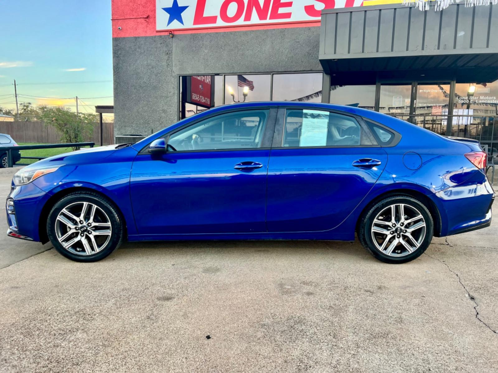 2019 BLUE /Gray KIA FORTE S S 4dr Sedan (3KPF34AD5KE) with an 2.0L I4 engine, CVT transmission, located at 5900 E. Lancaster Ave., Fort Worth, TX, 76112, (817) 457-5456, 0.000000, 0.000000 - This is a 2019 Kia Forte S 4dr Sedan that is in excellent condition. There are no dents or scratches. The interior is clean with no rips or tears or stains. All power windows, door locks and seats. Ice cold AC for those hot Texas summer days. It is equipped with a CD player, AM/FM radio, AUX port, B - Photo #2
