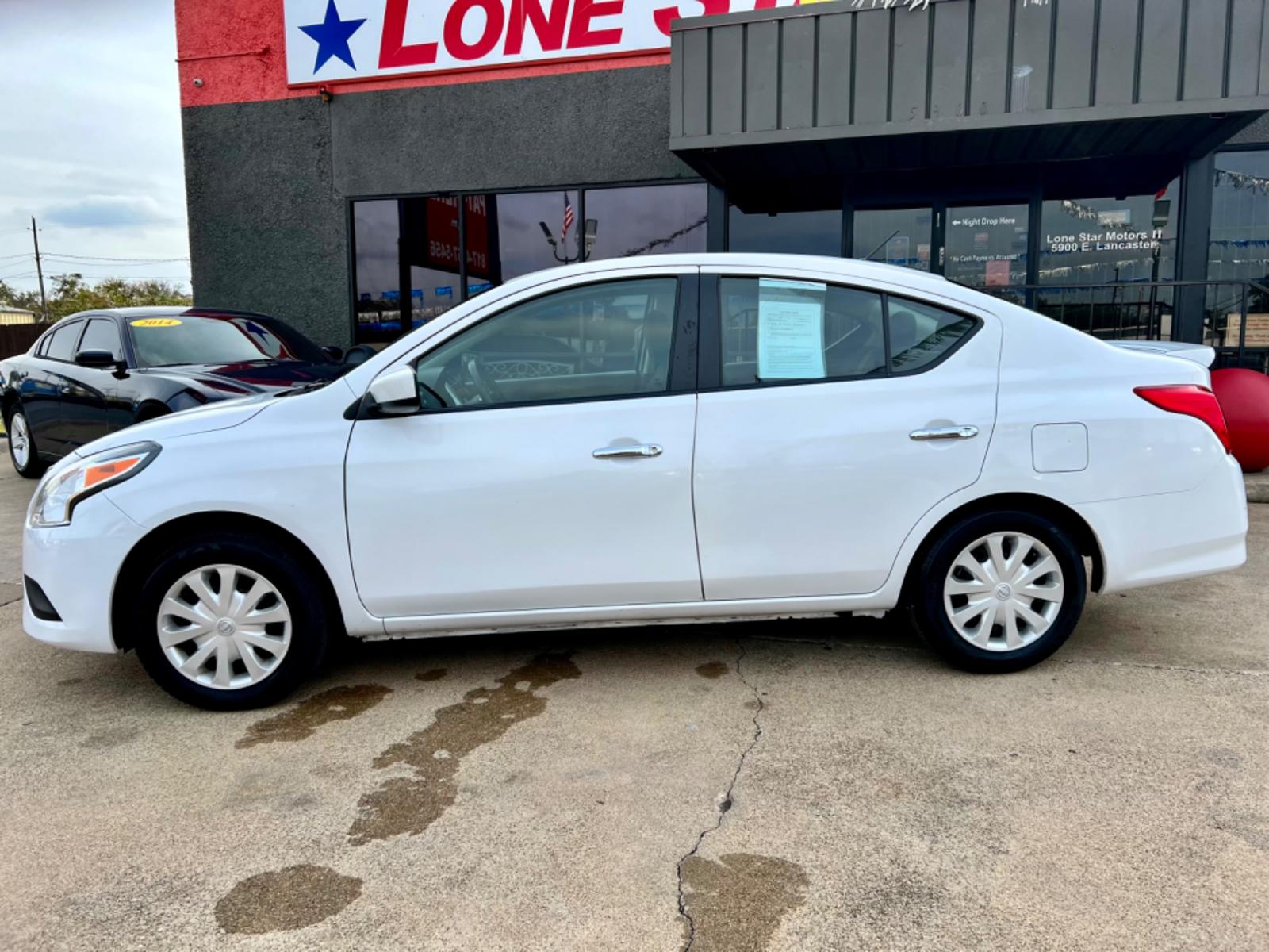 2019 WHITE /Gray NISSAN VERSA S 4dr Sedan (3N1CN7AP3KL) with an 1.6L I4 engine, Automatic 5-Speed transmission, located at 5900 E. Lancaster Ave., Fort Worth, TX, 76112, (817) 457-5456, 0.000000, 0.000000 - This is a 2019 Nissan Versa S 4dr Sedan that is in excellent condition. There are no dents or scratches. The interior is clean with no rips or tears or stains. All power windows, door locks and seats. Ice cold AC for those hot Texas summer days. It is equipped with a CD player, AM/FM radio, AUX port - Photo #2