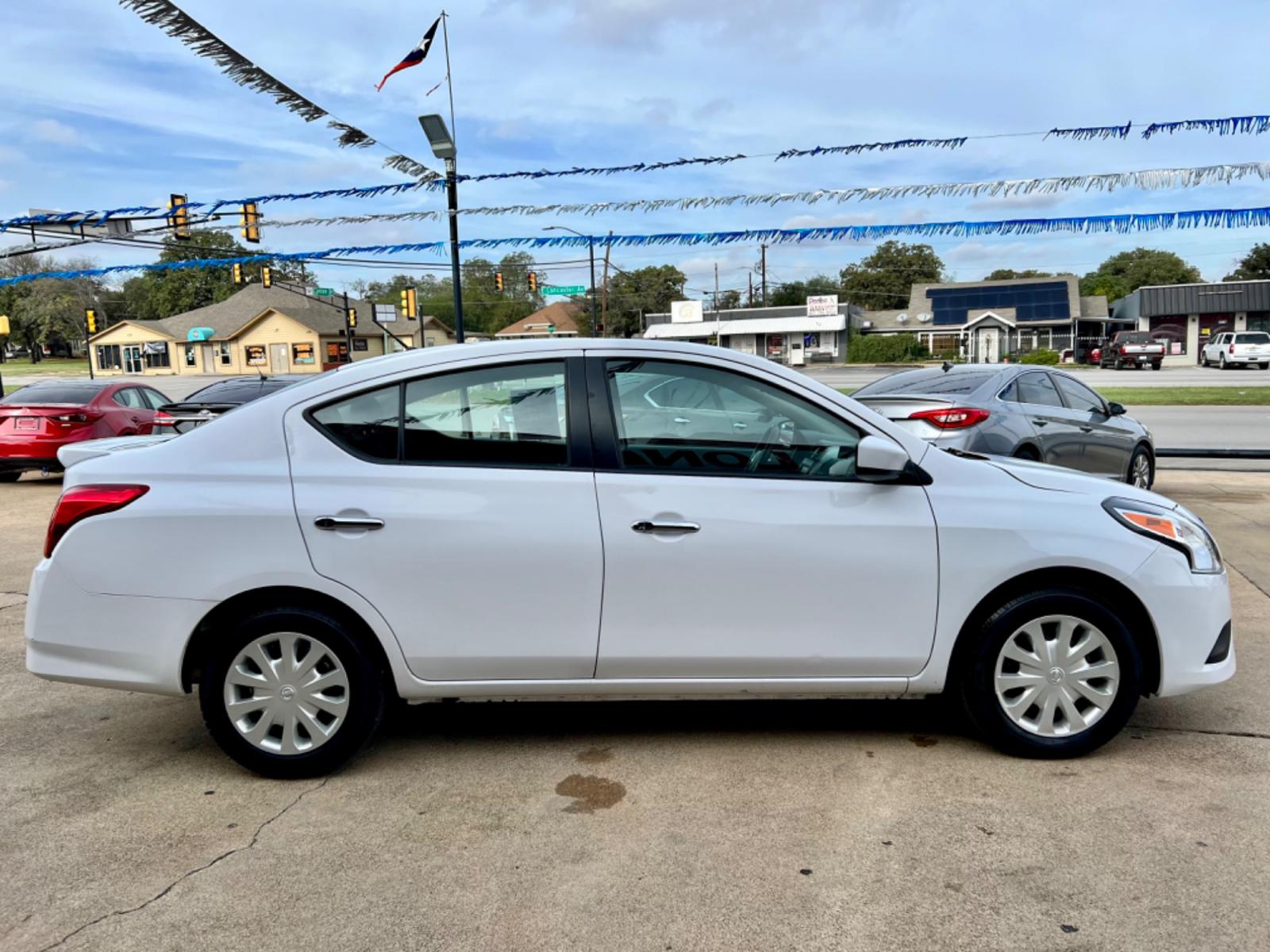 2019 WHITE /Gray NISSAN VERSA S 4dr Sedan (3N1CN7AP3KL) with an 1.6L I4 engine, Automatic 5-Speed transmission, located at 5900 E. Lancaster Ave., Fort Worth, TX, 76112, (817) 457-5456, 0.000000, 0.000000 - This is a 2019 Nissan Versa S 4dr Sedan that is in excellent condition. There are no dents or scratches. The interior is clean with no rips or tears or stains. All power windows, door locks and seats. Ice cold AC for those hot Texas summer days. It is equipped with a CD player, AM/FM radio, AUX port - Photo #6