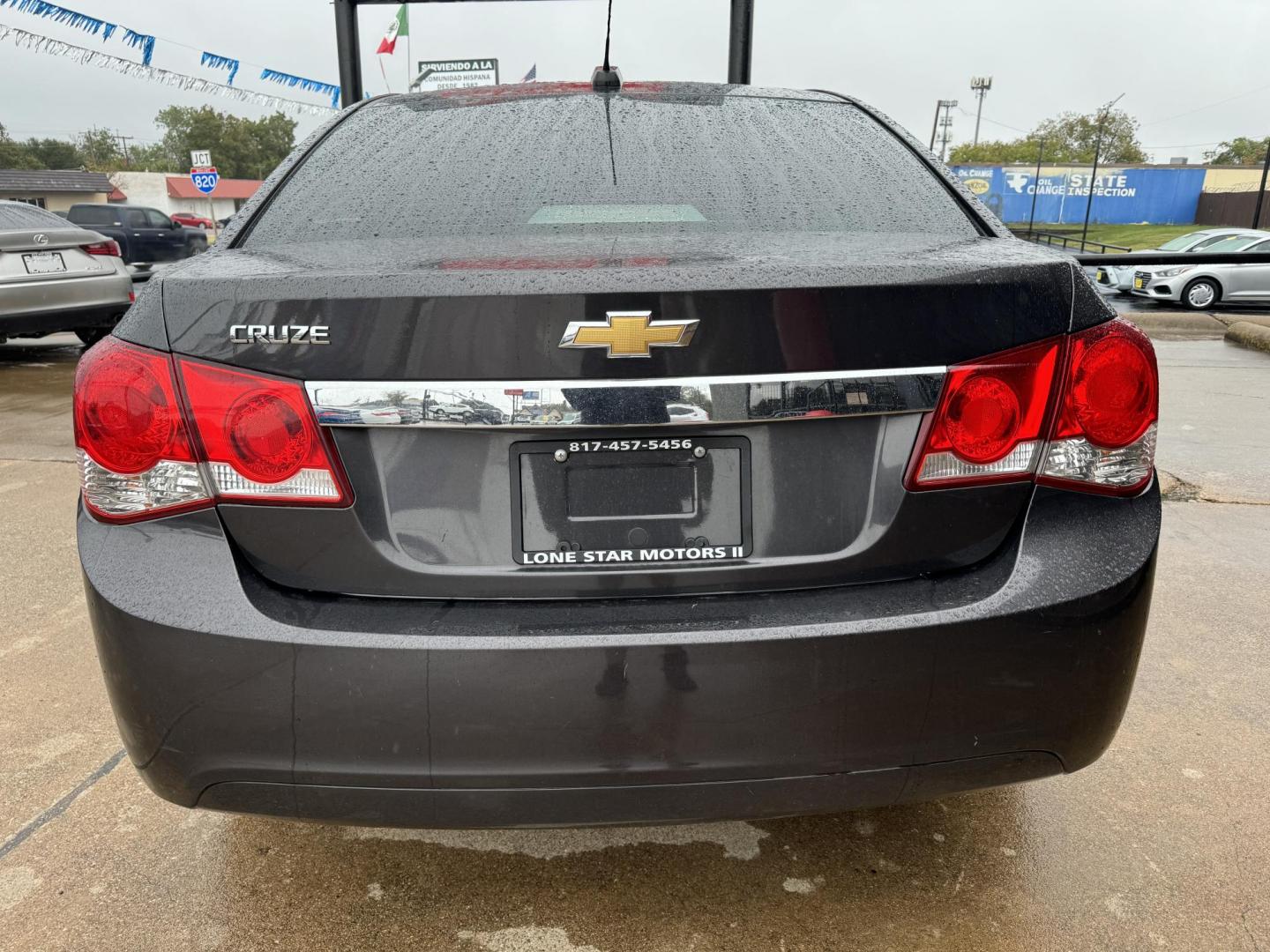 2016 GRAY /Gray CHEVROLET CRUZE LIMITED 1LT Auto 4dr Sedan w/1SD (1G1PE5SB9G7) with an 1.4L I4 Turbocharger engine, Automatic 6-Speed transmission, located at 5900 E. Lancaster Ave., Fort Worth, TX, 76112, (817) 457-5456, 0.000000, 0.000000 - This is a 2016 Chevrolet Cruze Limited 1LT Auto 4dr Sedan w/1SD that is in excellent condition. There are no dents or scratches. The interior is clean with no rips or tears or stains. All power windows, door locks and seats. Ice cold AC for those hot Texas summer days. It is equipped with a CD playe - Photo#5