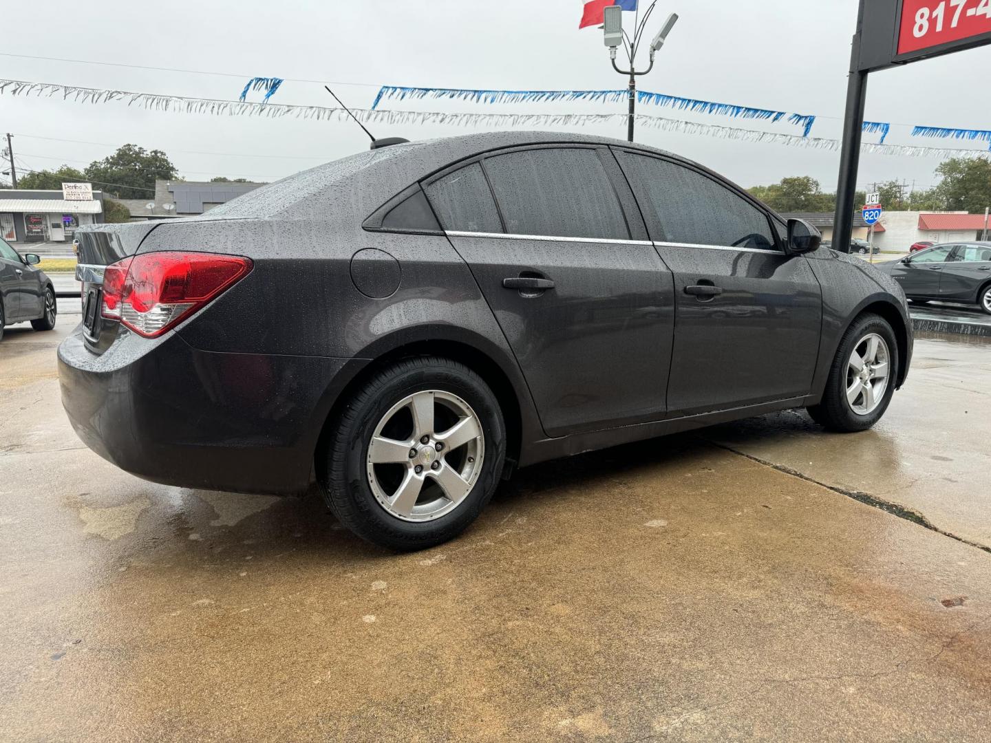 2016 GRAY /Gray CHEVROLET CRUZE LIMITED 1LT Auto 4dr Sedan w/1SD (1G1PE5SB9G7) with an 1.4L I4 Turbocharger engine, Automatic 6-Speed transmission, located at 5900 E. Lancaster Ave., Fort Worth, TX, 76112, (817) 457-5456, 0.000000, 0.000000 - This is a 2016 Chevrolet Cruze Limited 1LT Auto 4dr Sedan w/1SD that is in excellent condition. There are no dents or scratches. The interior is clean with no rips or tears or stains. All power windows, door locks and seats. Ice cold AC for those hot Texas summer days. It is equipped with a CD playe - Photo#4