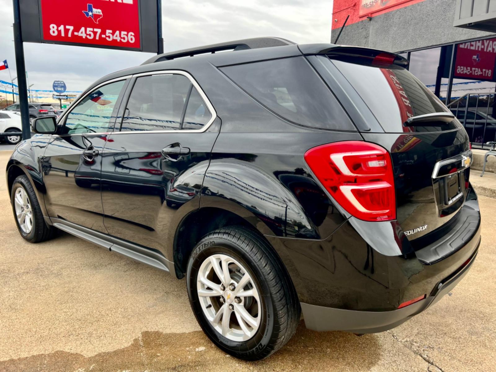 2017 BLACK /Gray CHEVROLET EQUINOX LT 4dr SUV w/1LT (2GNALCEK0H6) with an 2.4L I4 engine, Automatic 6-Speed transmission, located at 5900 E. Lancaster Ave., Fort Worth, TX, 76112, (817) 457-5456, 0.000000, 0.000000 - This is a 2017 Chevrolet Equinox LT 4dr SUV w/1LT that is in excellent condition. There are no dents or scratches. The interior is clean with no rips or tears or stains. All power windows, door locks and seats. Ice cold AC for those hot Texas summer days. It is equipped with a CD player, AM/FM radio - Photo #3