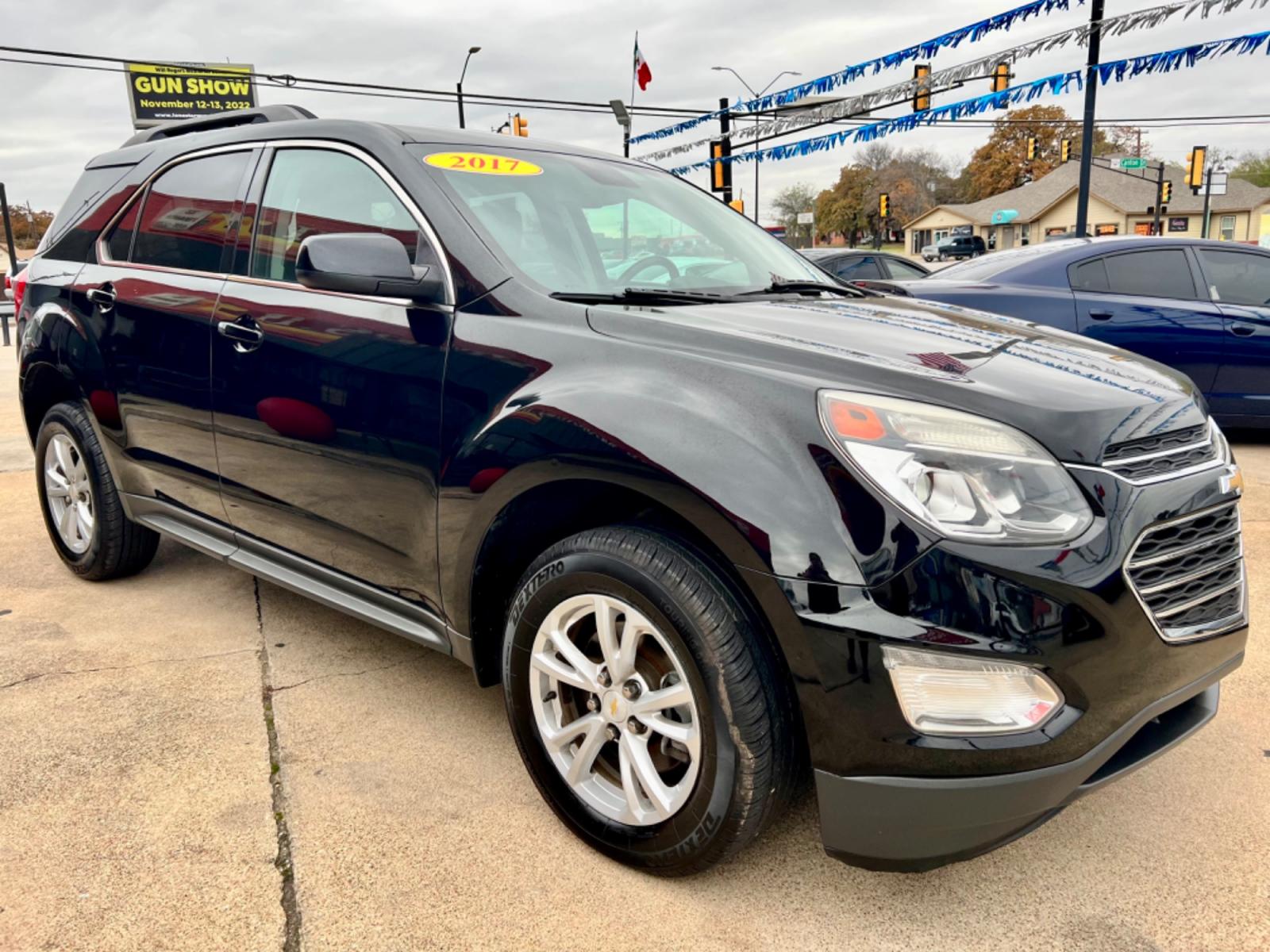 2017 BLACK /Gray CHEVROLET EQUINOX LT 4dr SUV w/1LT (2GNALCEK0H6) with an 2.4L I4 engine, Automatic 6-Speed transmission, located at 5900 E. Lancaster Ave., Fort Worth, TX, 76112, (817) 457-5456, 0.000000, 0.000000 - This is a 2017 Chevrolet Equinox LT 4dr SUV w/1LT that is in excellent condition. There are no dents or scratches. The interior is clean with no rips or tears or stains. All power windows, door locks and seats. Ice cold AC for those hot Texas summer days. It is equipped with a CD player, AM/FM radio - Photo #7