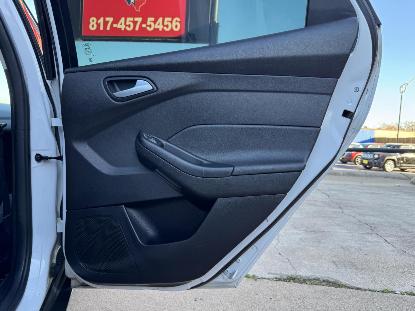 2018 WHITE /Gray FORD FOCUS SE 4dr Hatchback (1FADP3K25JL) with an 2.0L I4 engine, Automatic 6-Speed transmission, located at 5900 E. Lancaster Ave., Fort Worth, TX, 76112, (817) 457-5456, 0.000000, 0.000000 - This is a 2018 Ford Focus SE 4dr Hatchback that is in excellent condition. There are no dents or scratches. The interior is clean with no rips or tears or stains. All power windows, door locks and seats. Ice cold AC for those hot Texas summer days. It is equipped with a CD player, AM/FM radio, AUX p - Photo#12