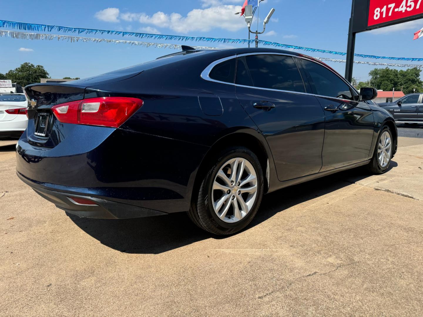 2018 BLUE /Gray CHEVROLET MALIBU LT 4dr Sedan (1G1ZD5ST5JF) with an 1.5L I4 Turbocharger engine, Automatic 6-Speed transmission, located at 5900 E. Lancaster Ave., Fort Worth, TX, 76112, (817) 457-5456, 0.000000, 0.000000 - This is a 2018 Chevrolet Malibu LT 4dr Sedan that is in excellent condition. There are no dents or scratches. The interior is clean with no rips or tears or stains. All power windows, door locks and seats. Ice cold AC for those hot Texas summer days. It is equipped with a CD player, AM/FM radio, AUX - Photo#3