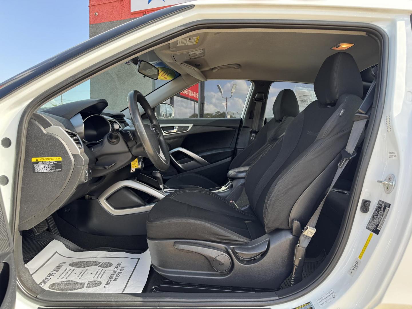 2016 WHITE /Gray HYUNDAI VELOSTER Base 3dr Coupe (KMHTC6AD7GU) with an 1.6L I4 engine, Automatic 6-Speed transmission, located at 5900 E. Lancaster Ave., Fort Worth, TX, 76112, (817) 457-5456, 0.000000, 0.000000 - This is a 2016 Hyundai Veloster Base 3dr Coupe that is in excellent condition. There are no dents or scratches. The interior is clean with no rips or tears or stains. All power windows, door locks and seats. Ice cold AC for those hot Texas summer days. It is equipped with a CD player, AM/FM radio, A - Photo#9