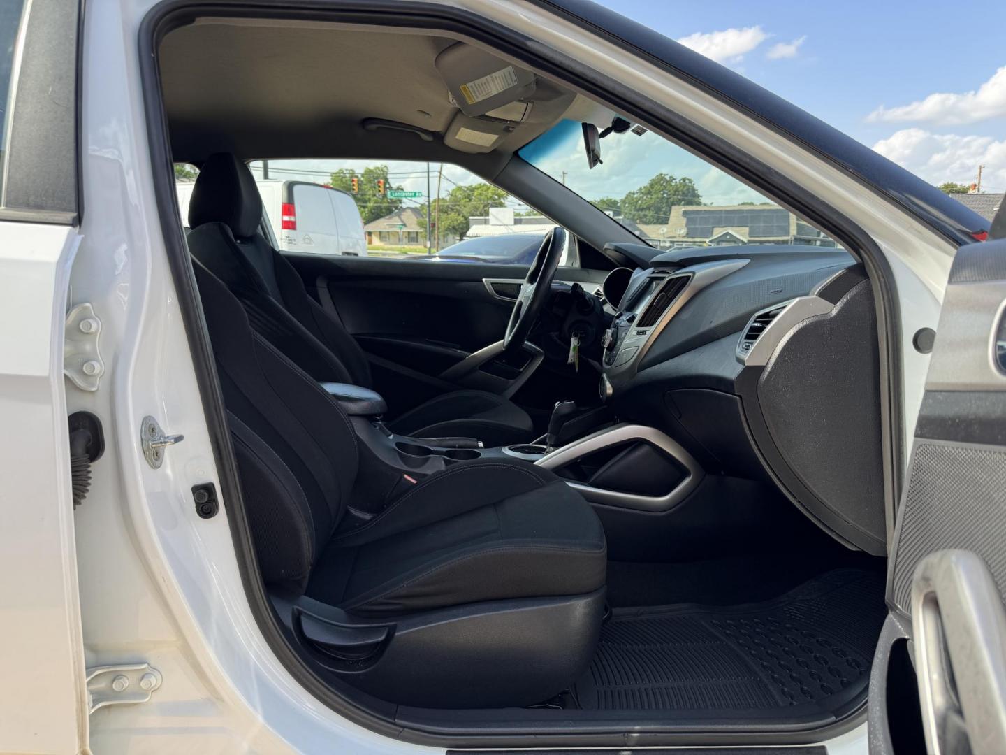2016 WHITE /Gray HYUNDAI VELOSTER Base 3dr Coupe (KMHTC6AD7GU) with an 1.6L I4 engine, Automatic 6-Speed transmission, located at 5900 E. Lancaster Ave., Fort Worth, TX, 76112, (817) 457-5456, 0.000000, 0.000000 - This is a 2016 Hyundai Veloster Base 3dr Coupe that is in excellent condition. There are no dents or scratches. The interior is clean with no rips or tears or stains. All power windows, door locks and seats. Ice cold AC for those hot Texas summer days. It is equipped with a CD player, AM/FM radio, A - Photo#14