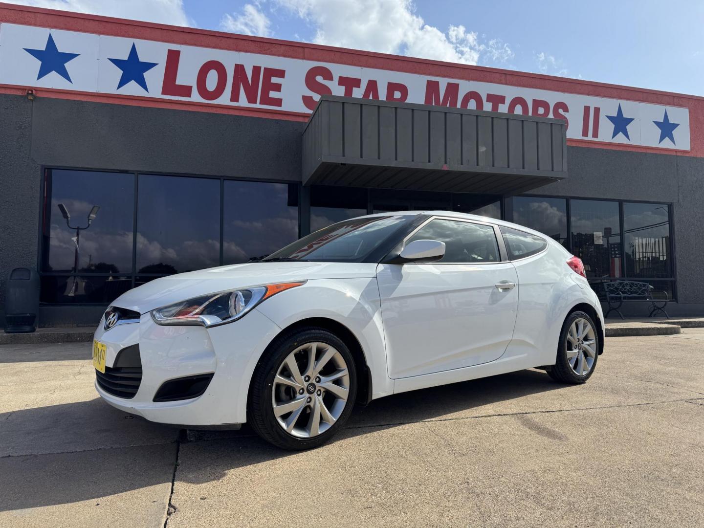 2016 WHITE /Gray HYUNDAI VELOSTER Base 3dr Coupe (KMHTC6AD7GU) with an 1.6L I4 engine, Automatic 6-Speed transmission, located at 5900 E. Lancaster Ave., Fort Worth, TX, 76112, (817) 457-5456, 0.000000, 0.000000 - This is a 2016 Hyundai Veloster Base 3dr Coupe that is in excellent condition. There are no dents or scratches. The interior is clean with no rips or tears or stains. All power windows, door locks and seats. Ice cold AC for those hot Texas summer days. It is equipped with a CD player, AM/FM radio, A - Photo#0